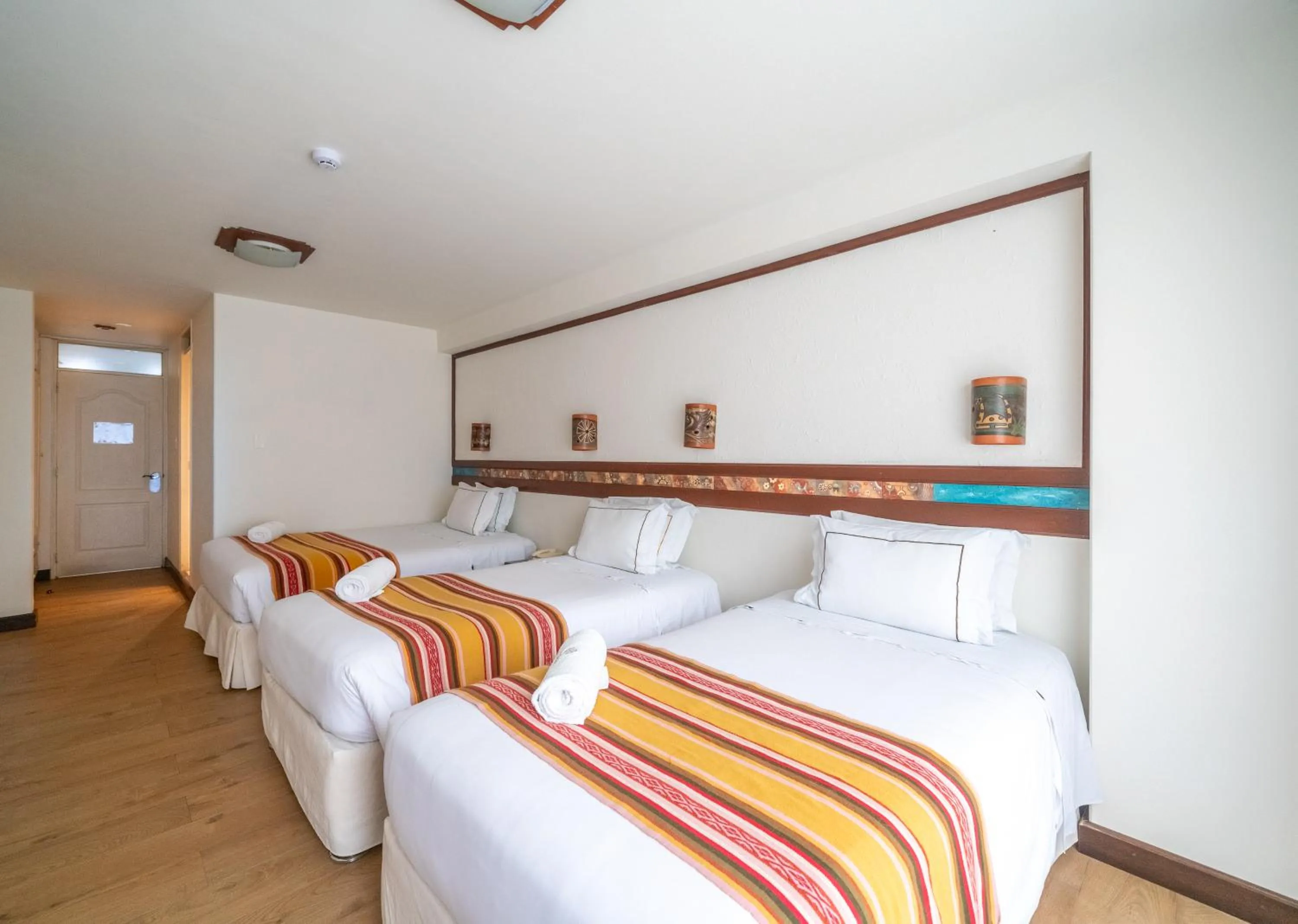 Photo of the whole room, Bed in Hotel Taypikala Machupicchu