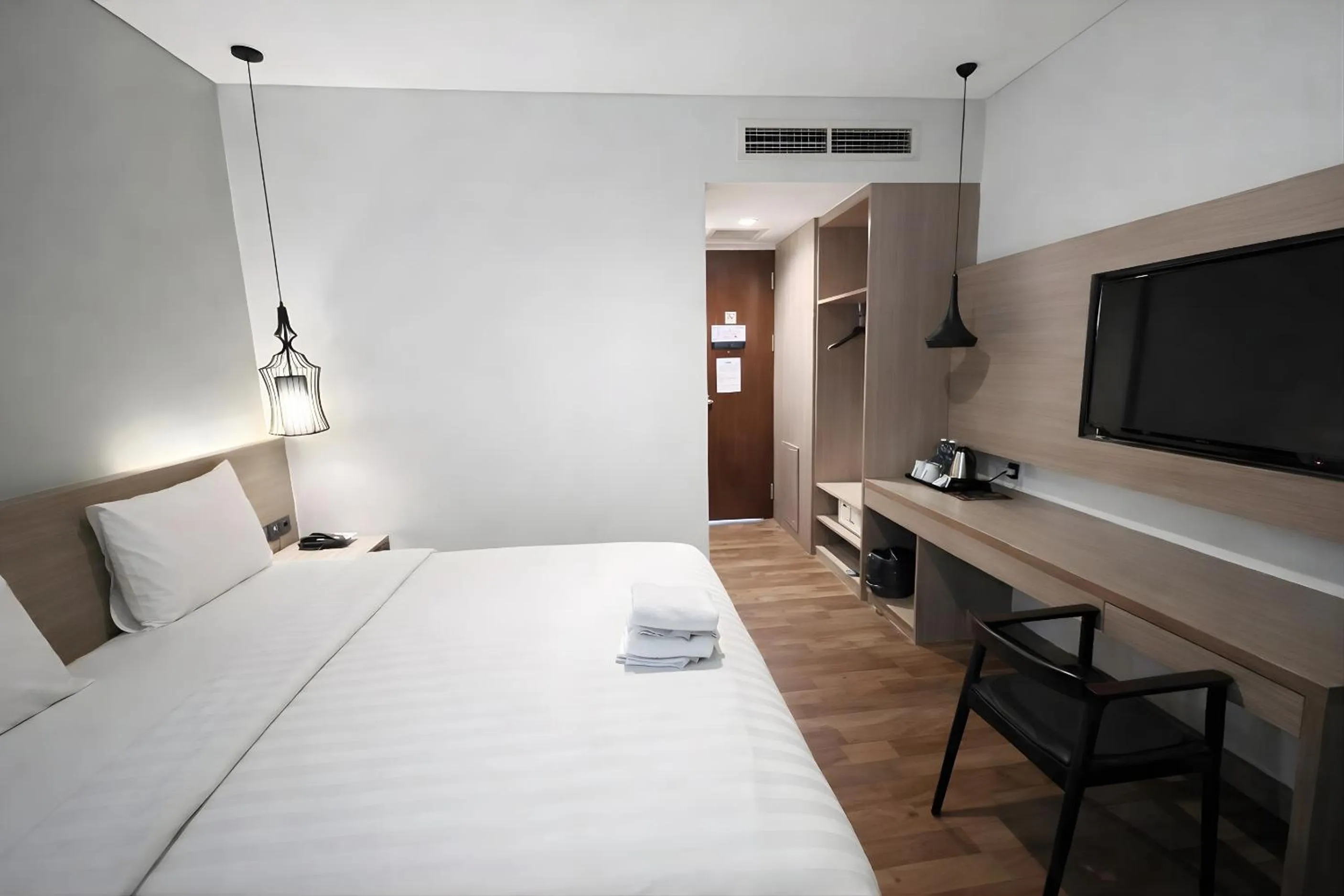 Bed in Rivoli Hotel Jakarta