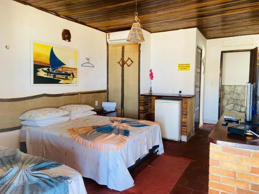 Bed in Pousada Brésil Aventure