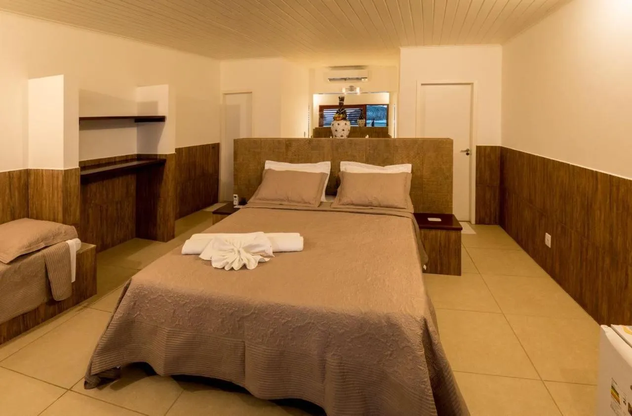 Bed in Pousada Brésil Aventure