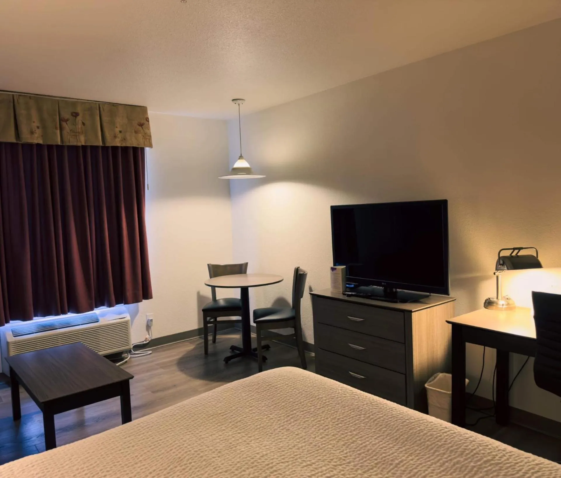 Bed in Super 8 by Wyndham Dawson Creek