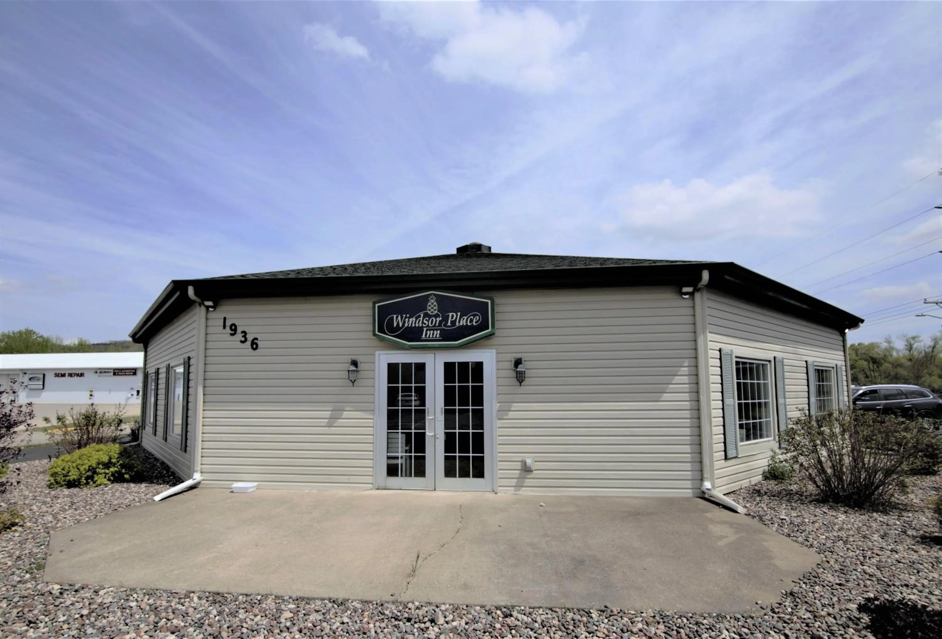 Property logo or sign in Windsor Place Inn