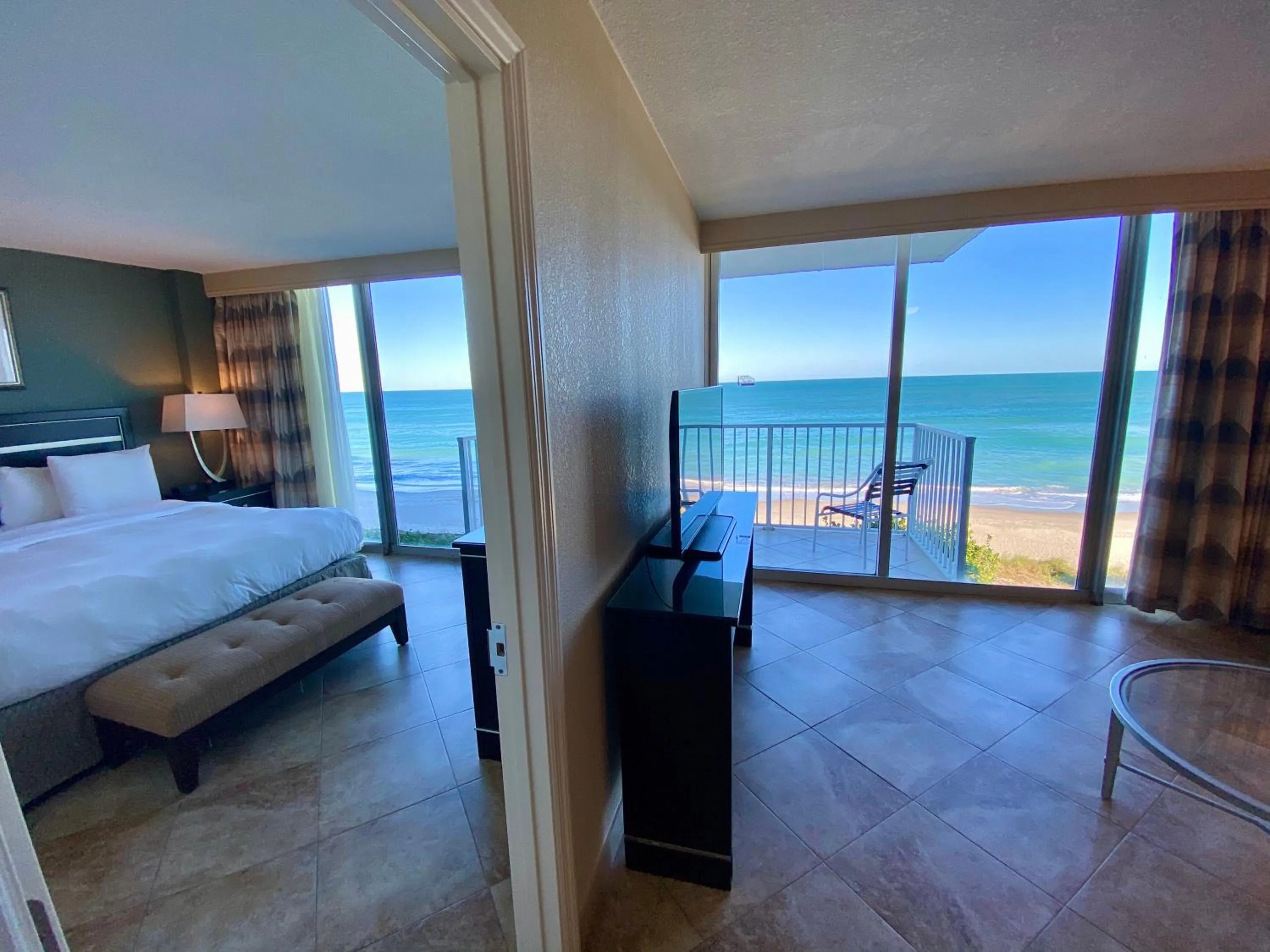 Bed in Radisson Suite Hotel Oceanfront