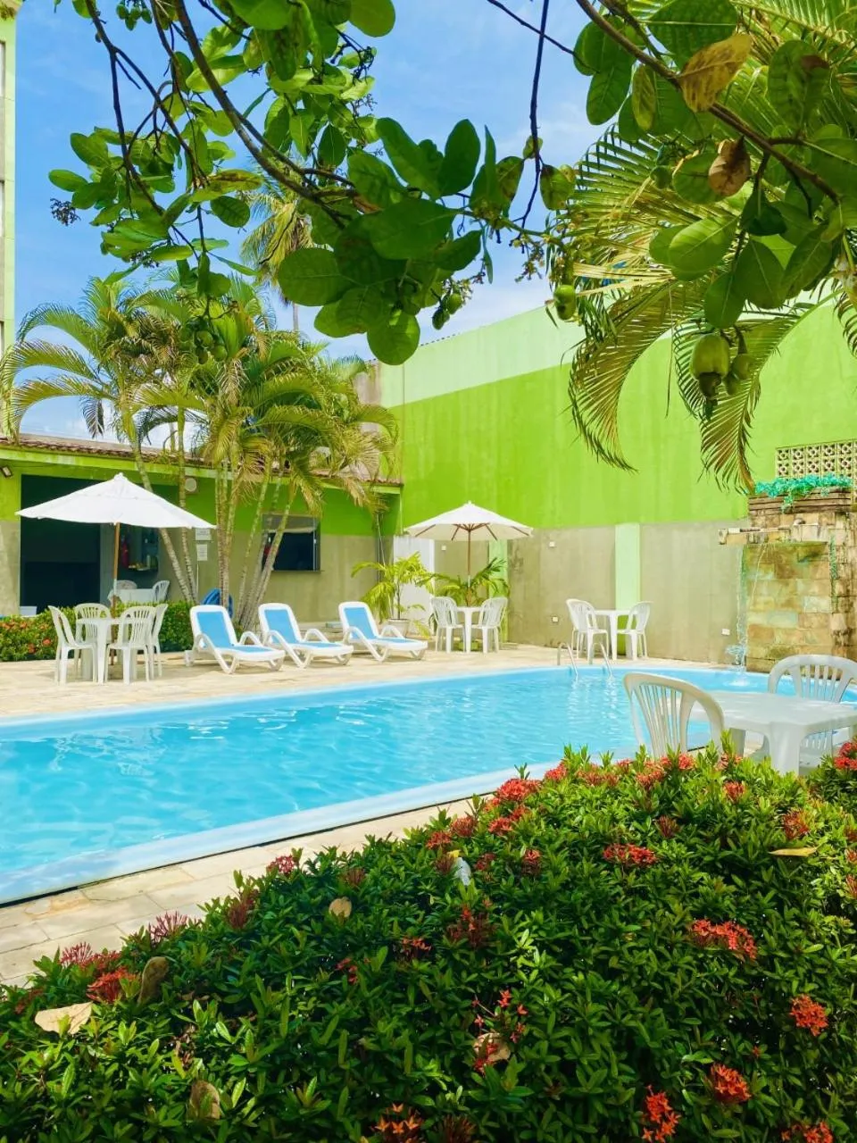 Swimming pool in Pousada o Caribe de Maragogi