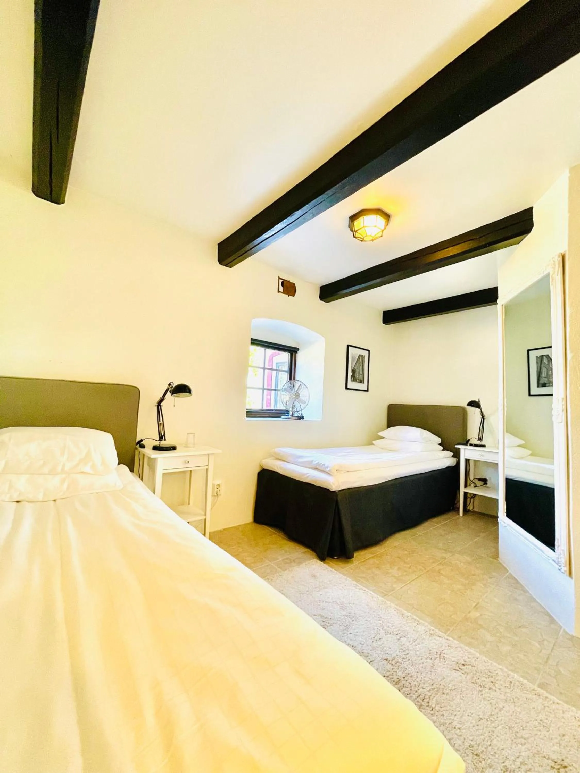 Photo of the whole room, Bed in Gårdshotellet