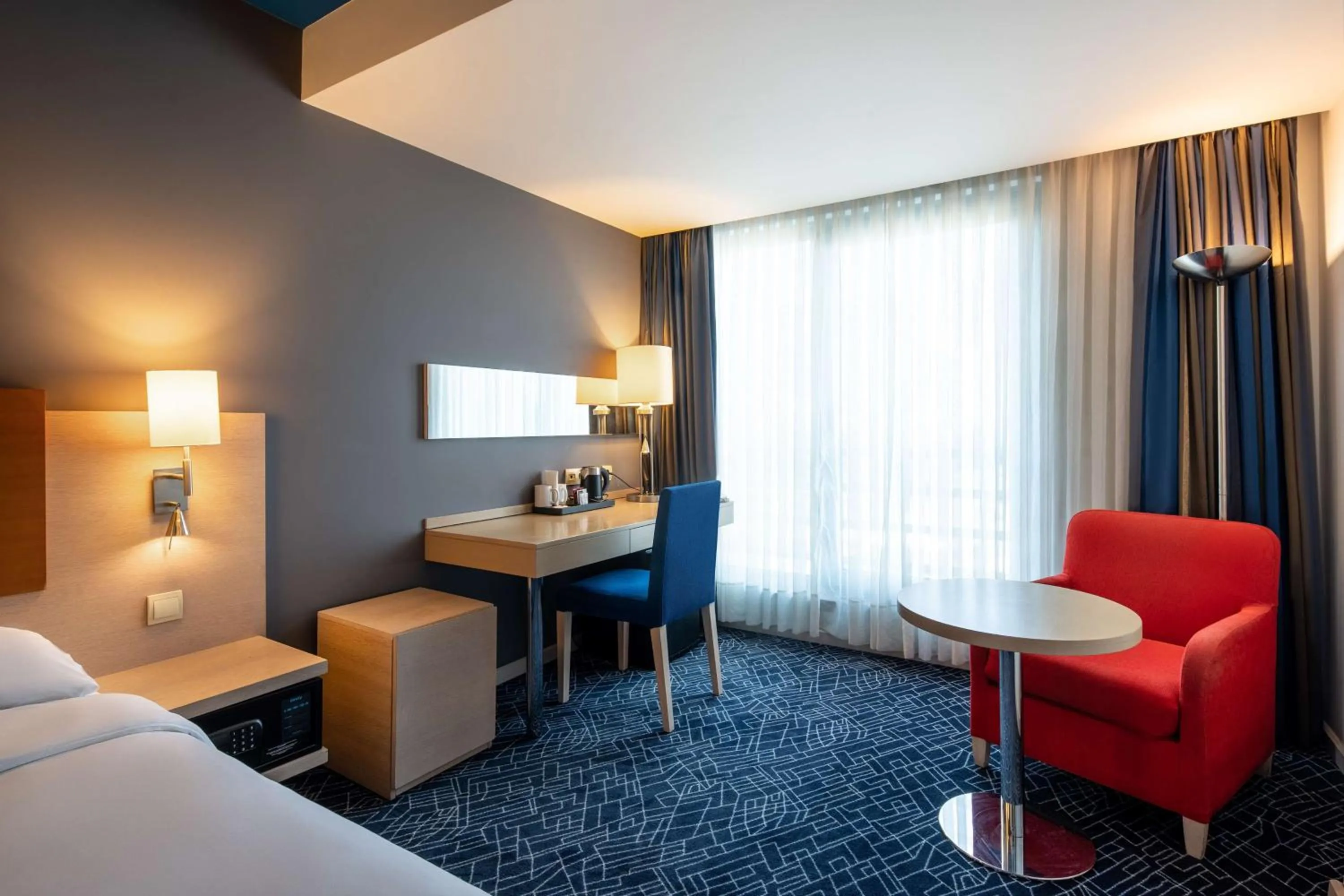 Seating area, Bed in Radisson Hotel Baku