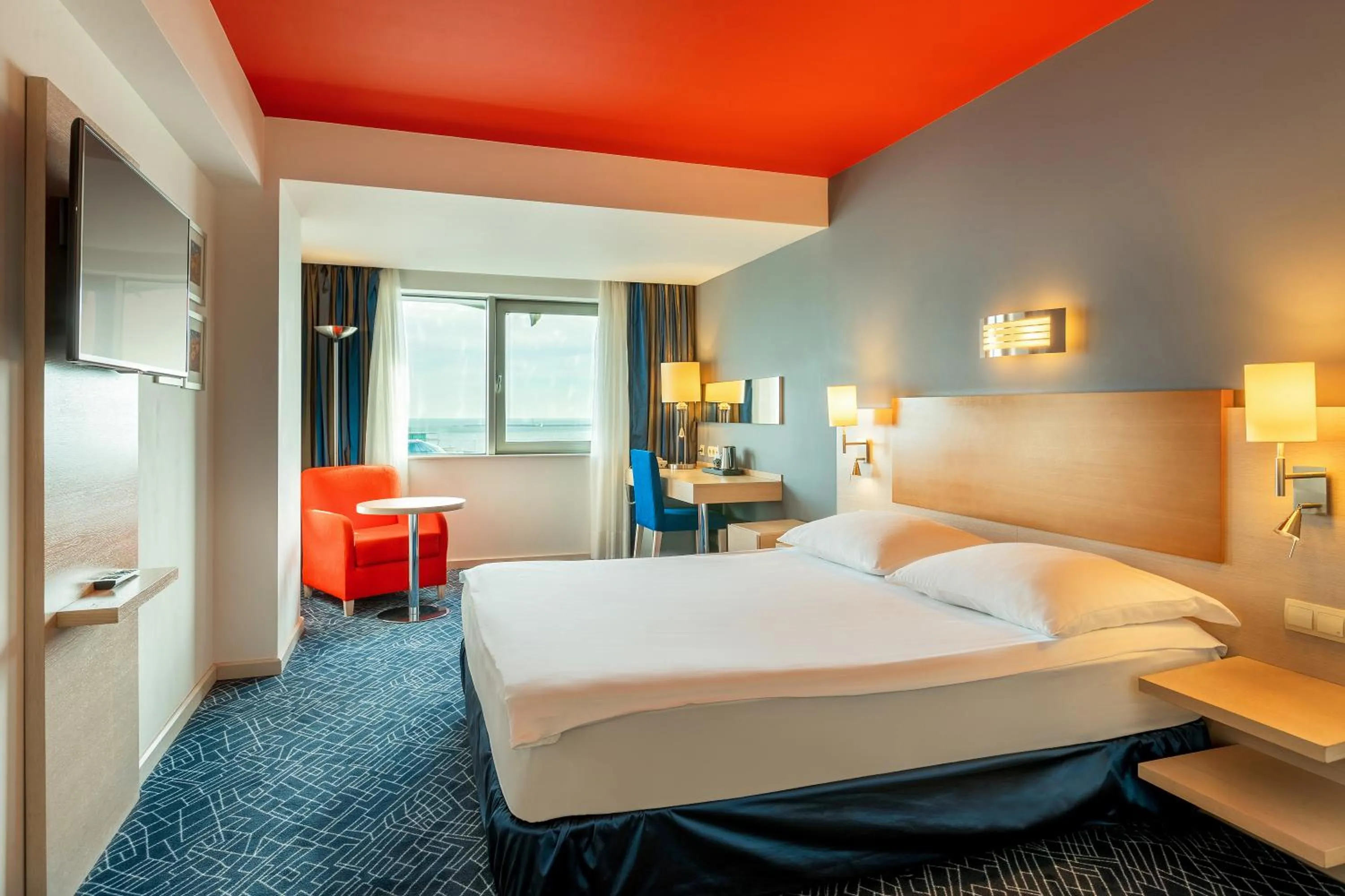 Living room, Bed in Radisson Hotel Baku