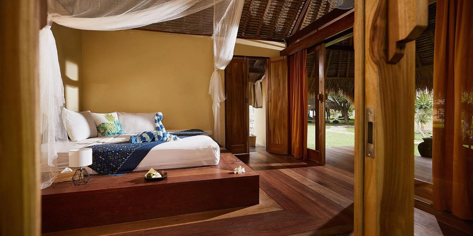 Bed in Pearl Beach Resort Gili Asahan