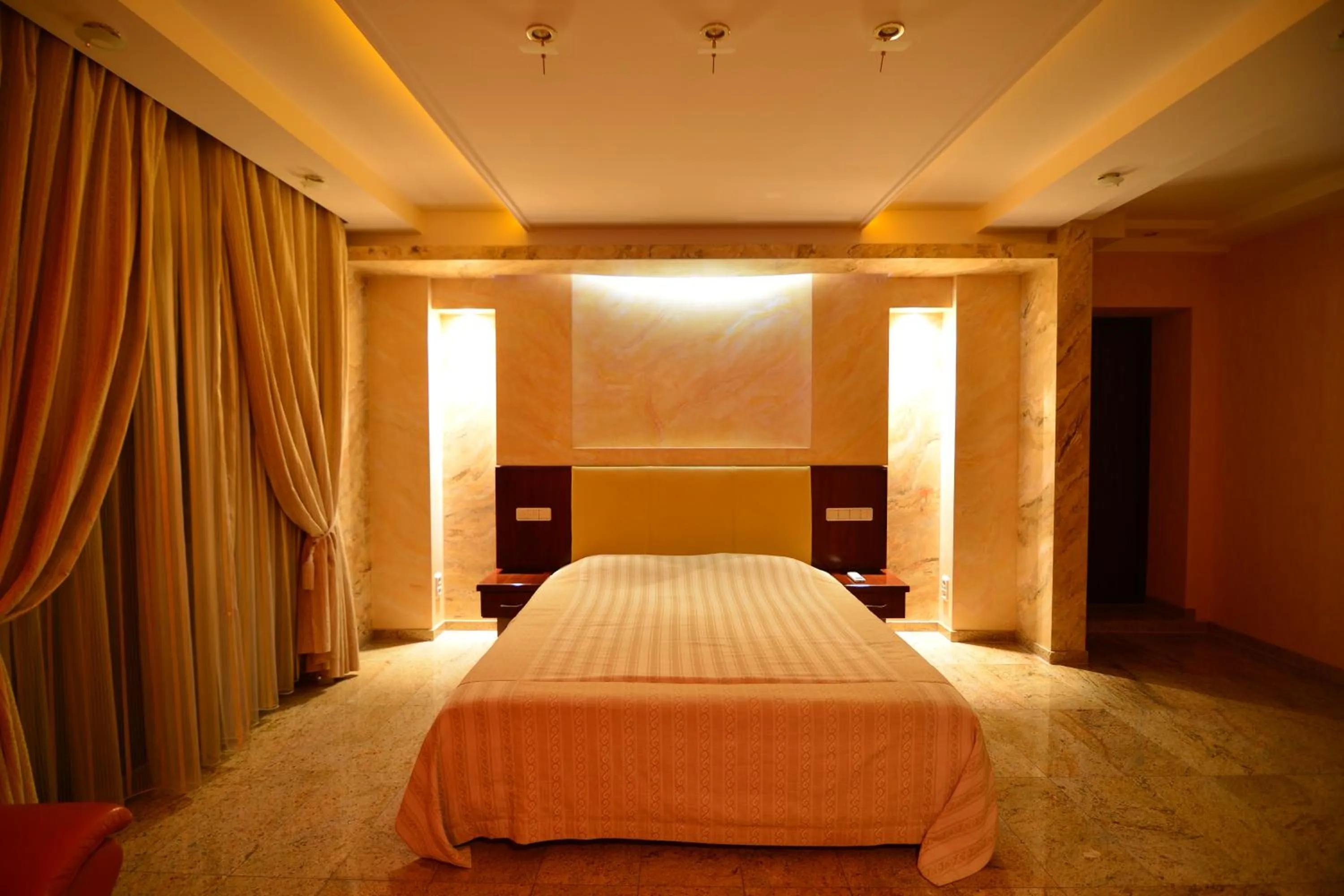 Bed in Prestige apart-hotel