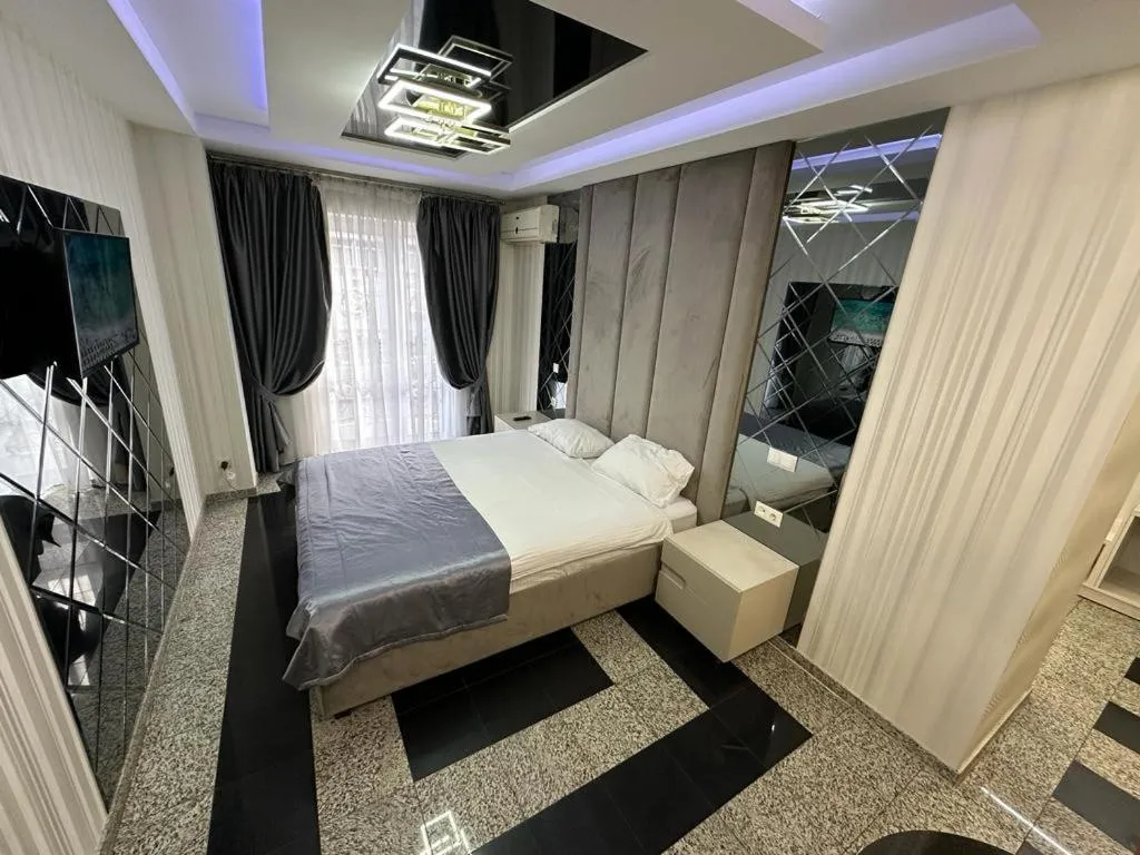 Bed in Prestige apart-hotel