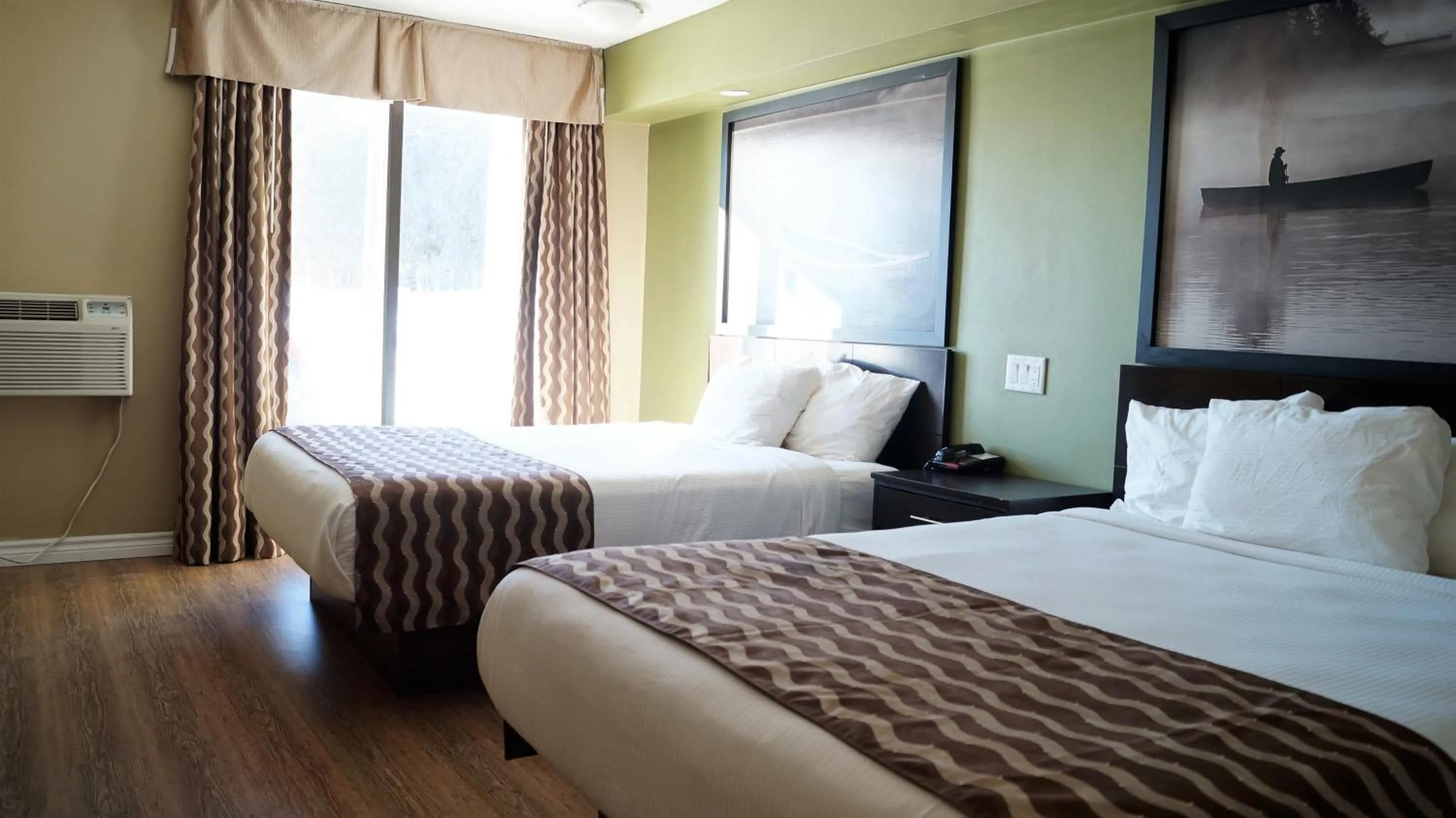 Bedroom in red maple inn and suites