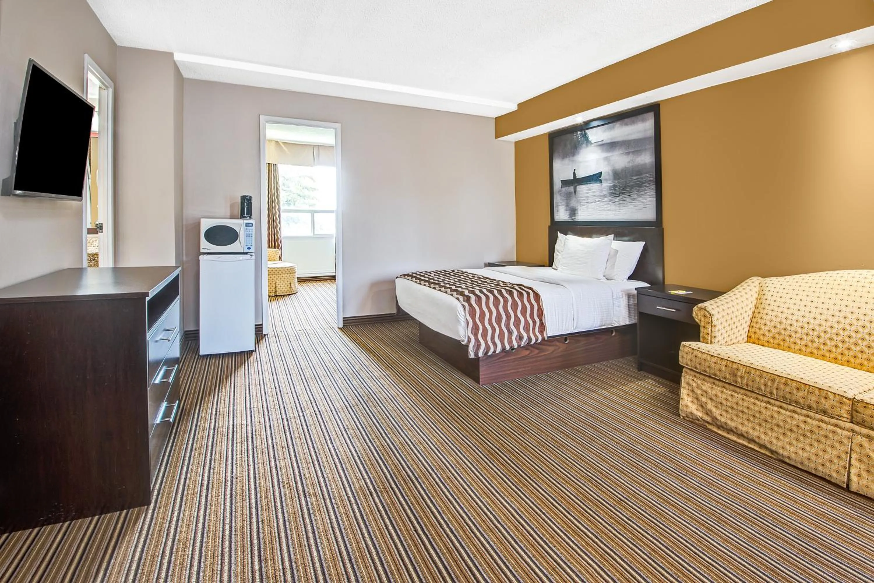 Photo of the whole room in red maple inn and suites