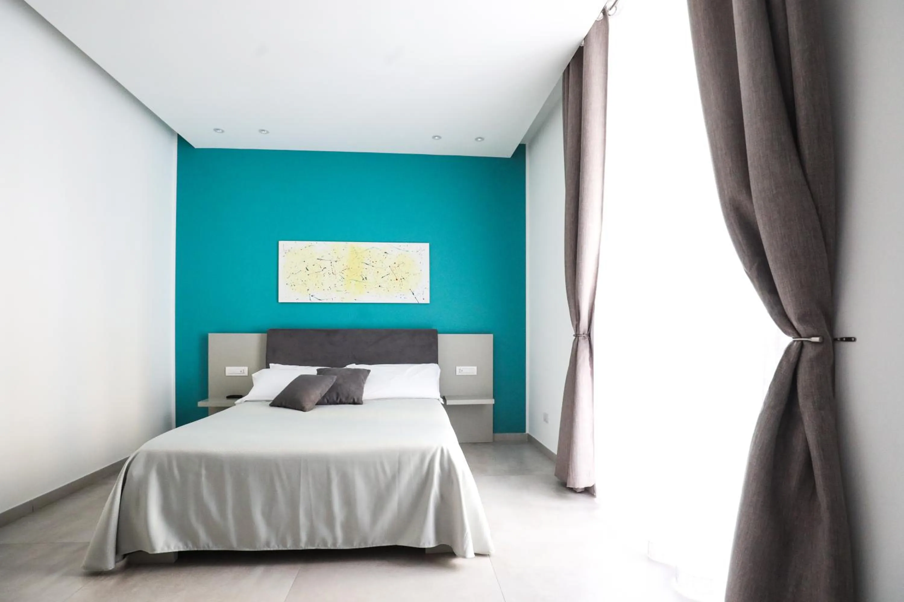 Bed in Toledo 16 Luxury Suites