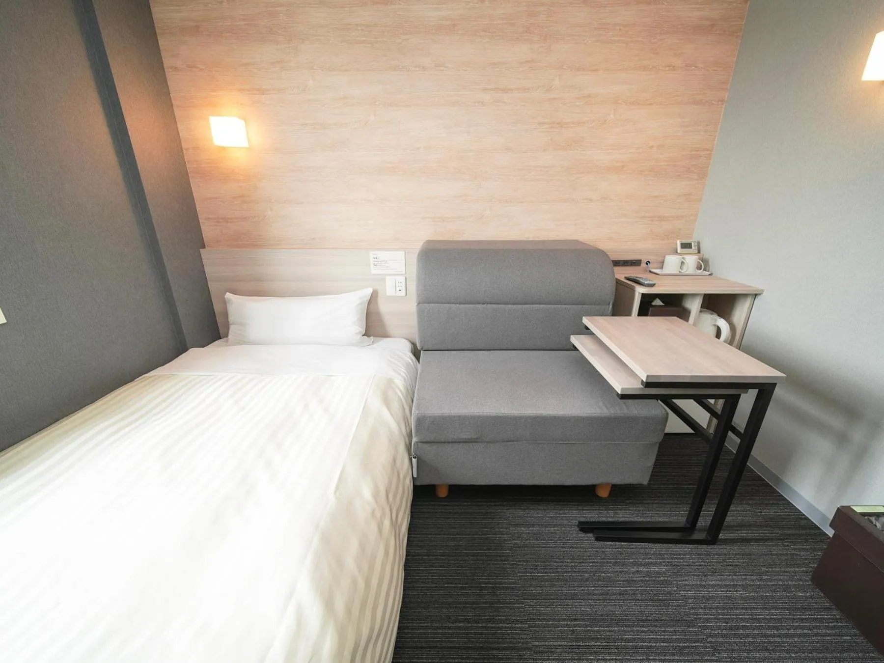 Bed in Super Hotel Kofu Showa Inter