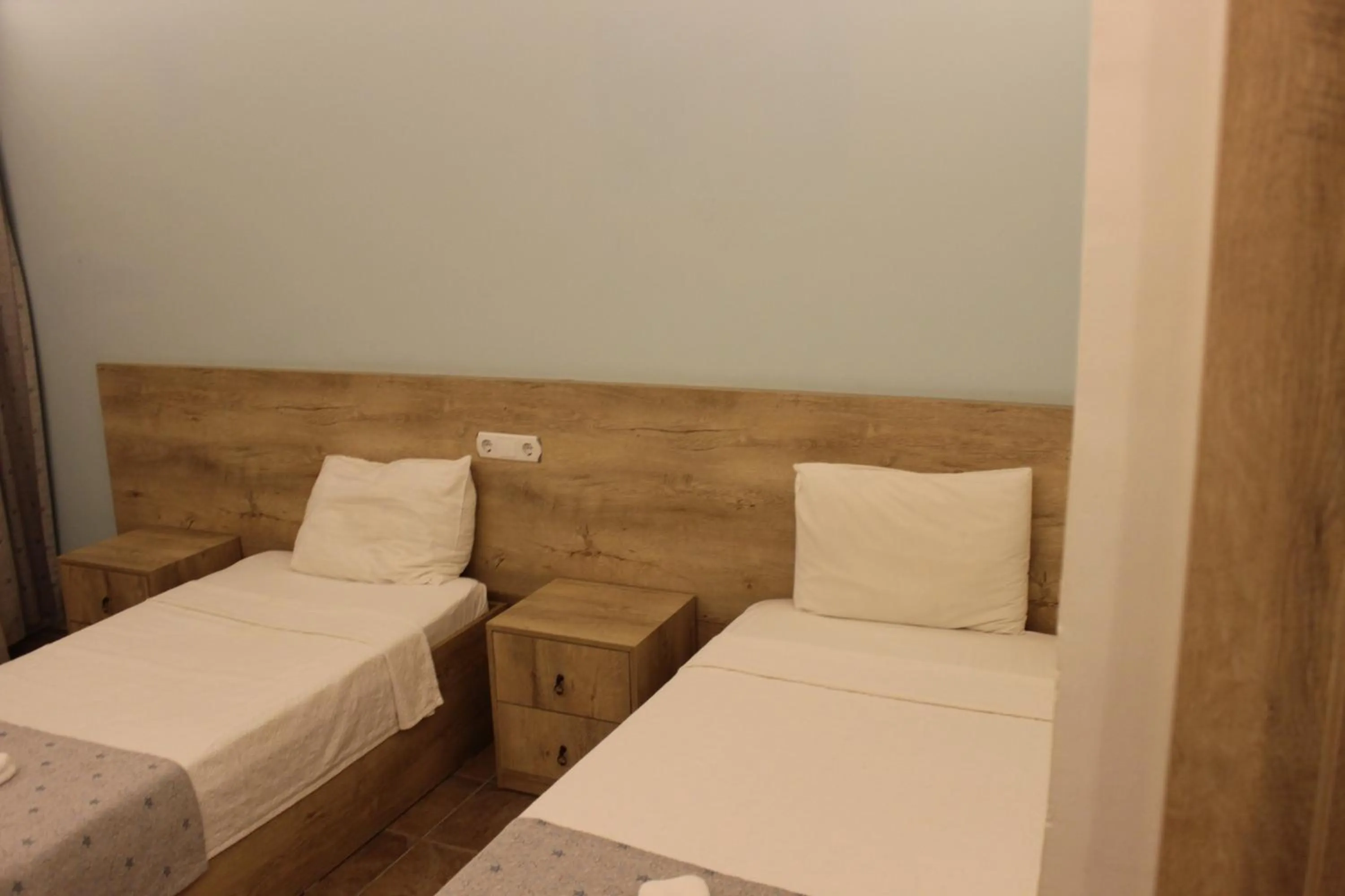 Bed in Tunacan Hotel