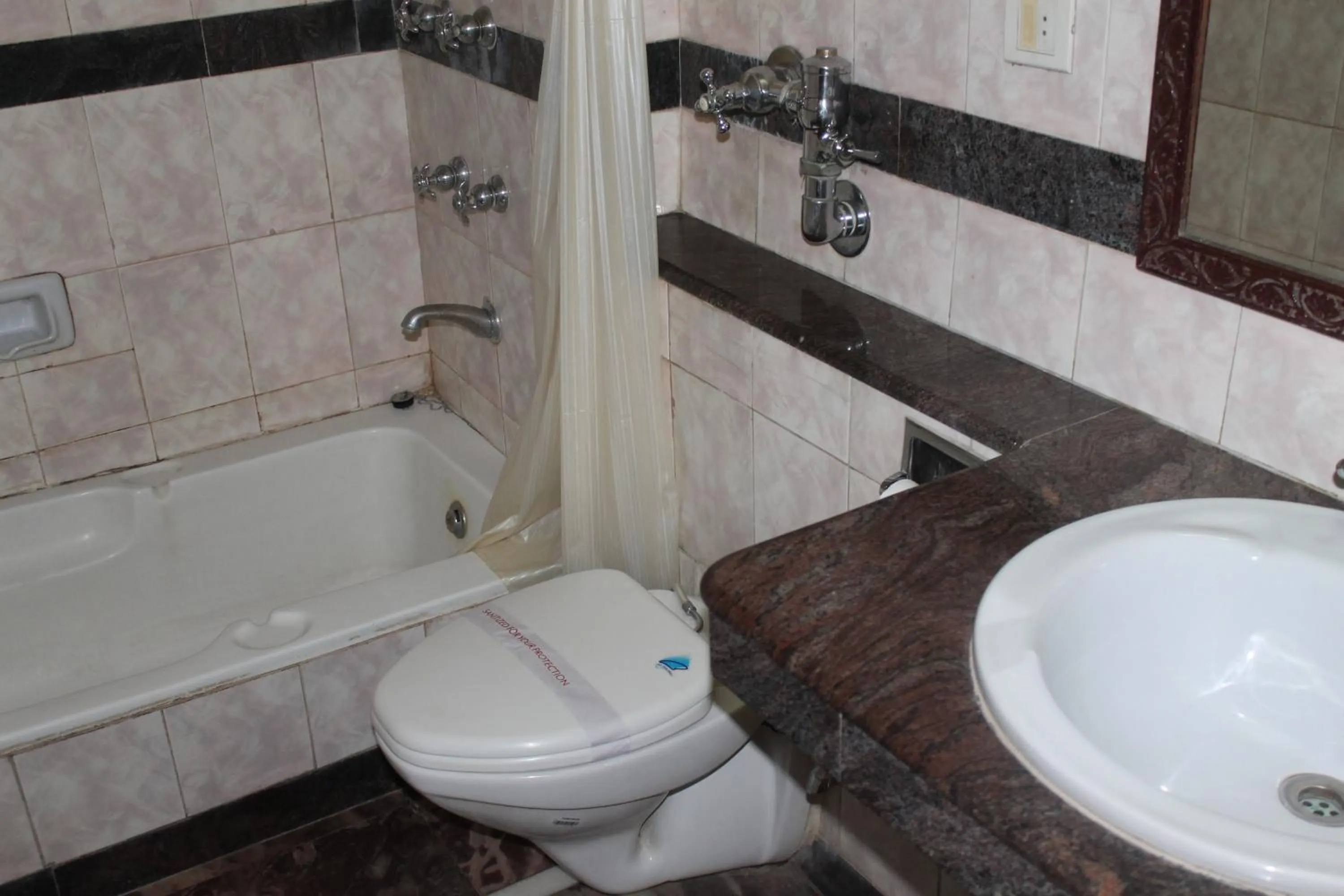 Shower in Hotel Sunstar Residency