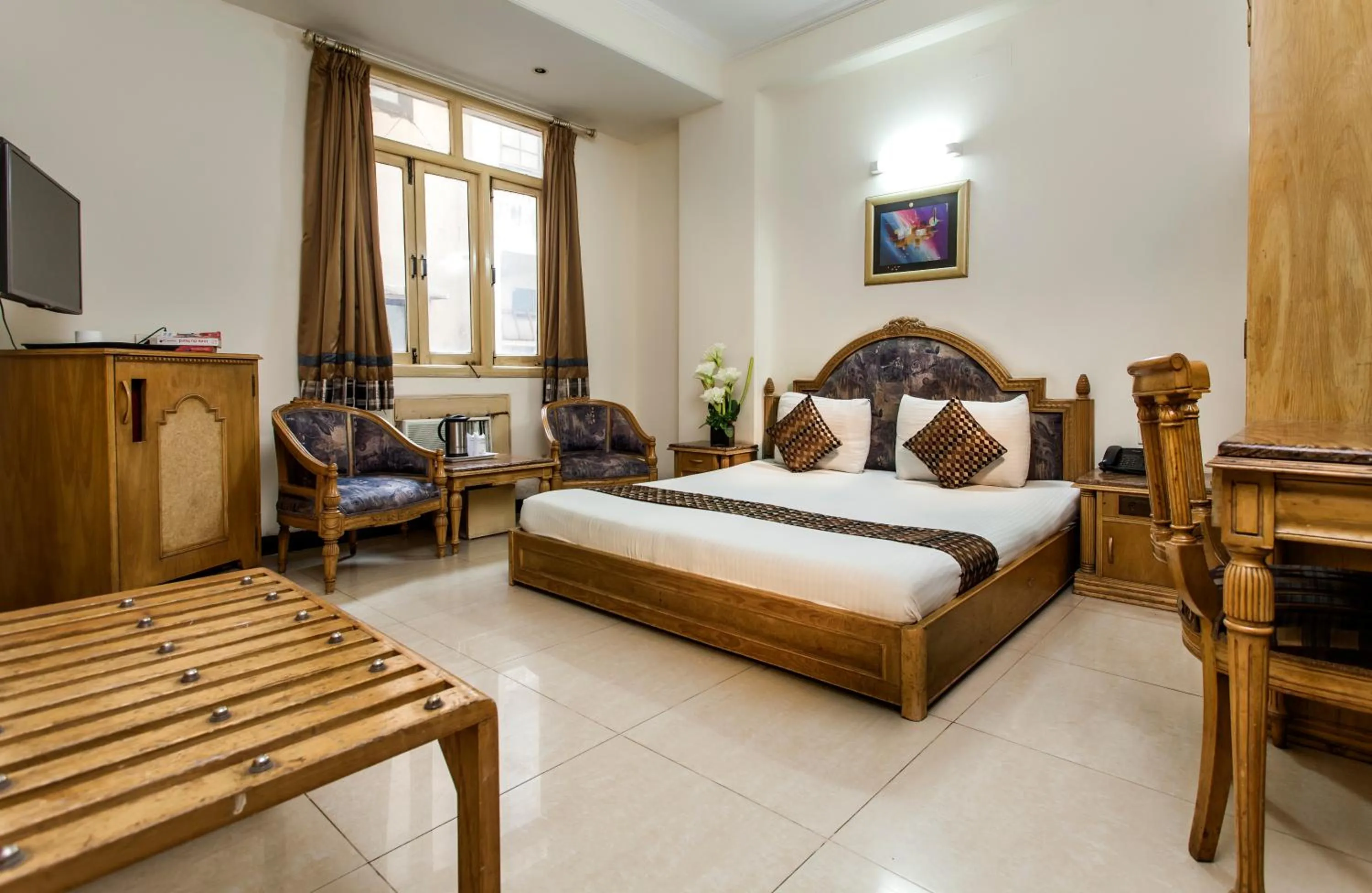 Bedroom, Bed in Hotel Sunstar Residency