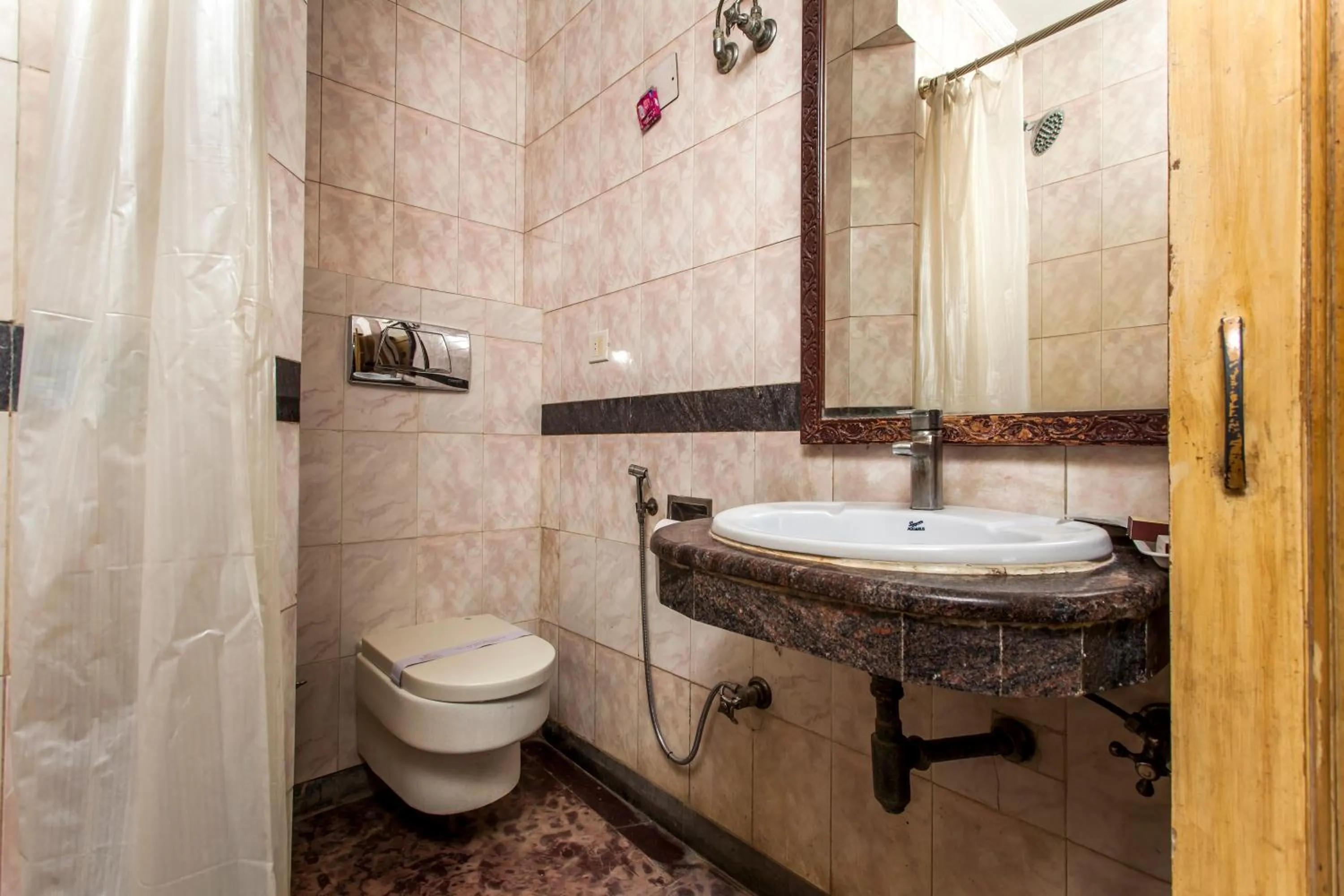 Bathroom in Hotel Sunstar Residency