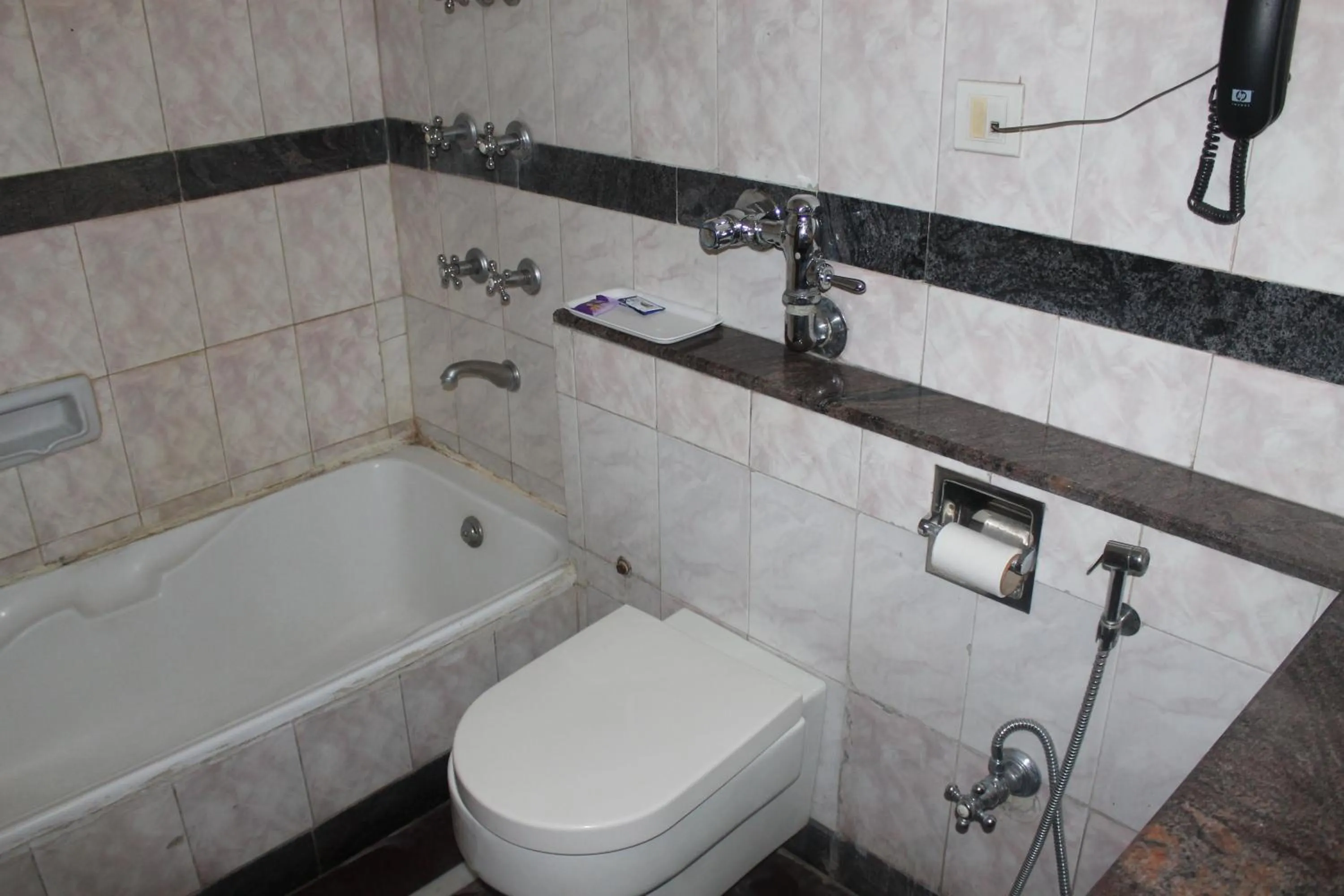 Shower in Hotel Sunstar Residency
