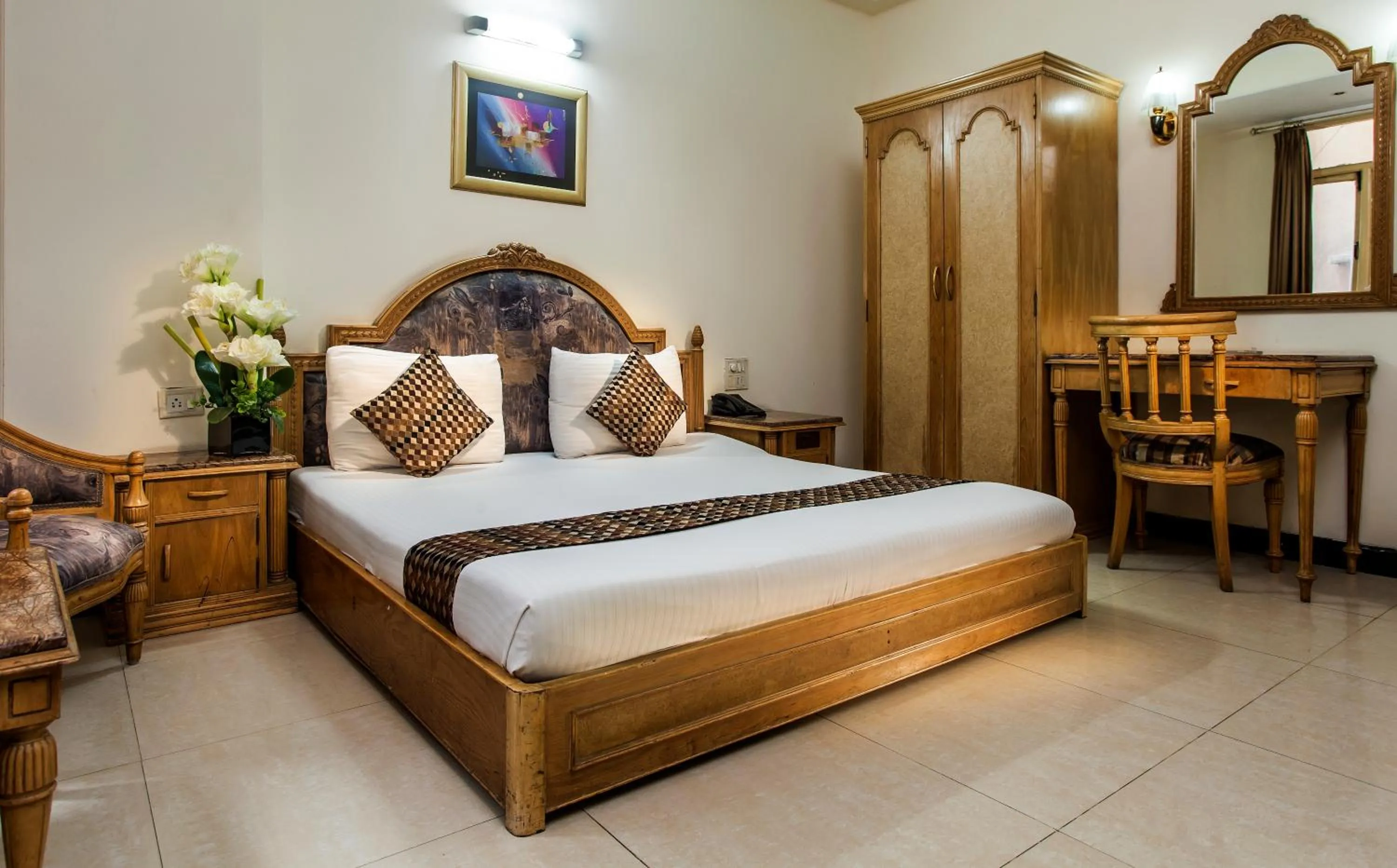 Bed in Hotel Sunstar Residency