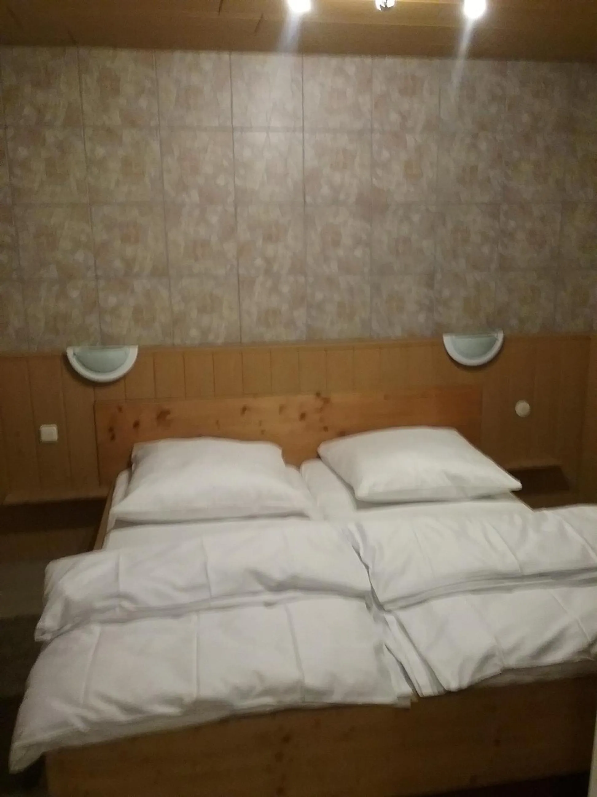 Bed in See Lord Hotel