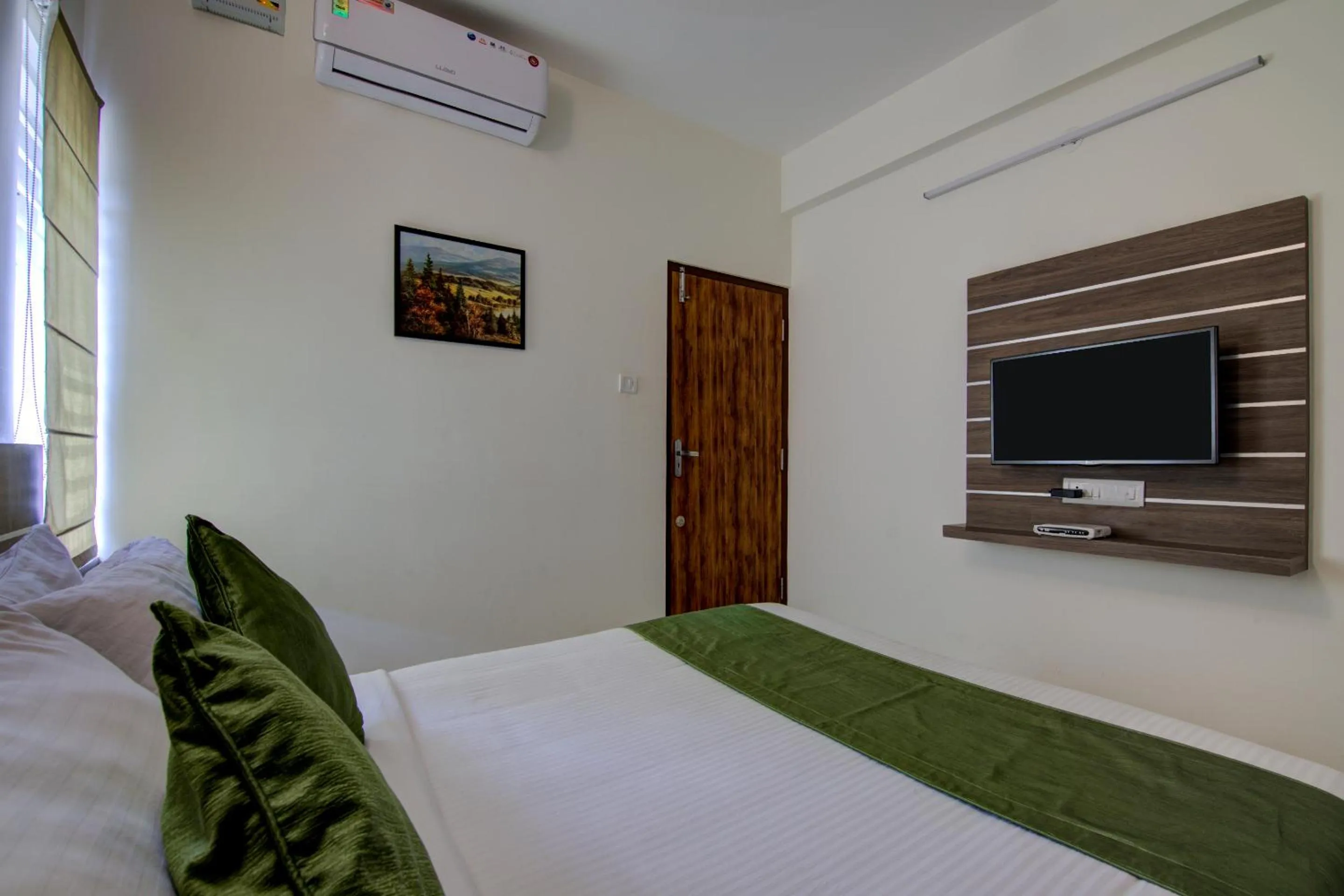 Bed in Sunshine Suites-Premium