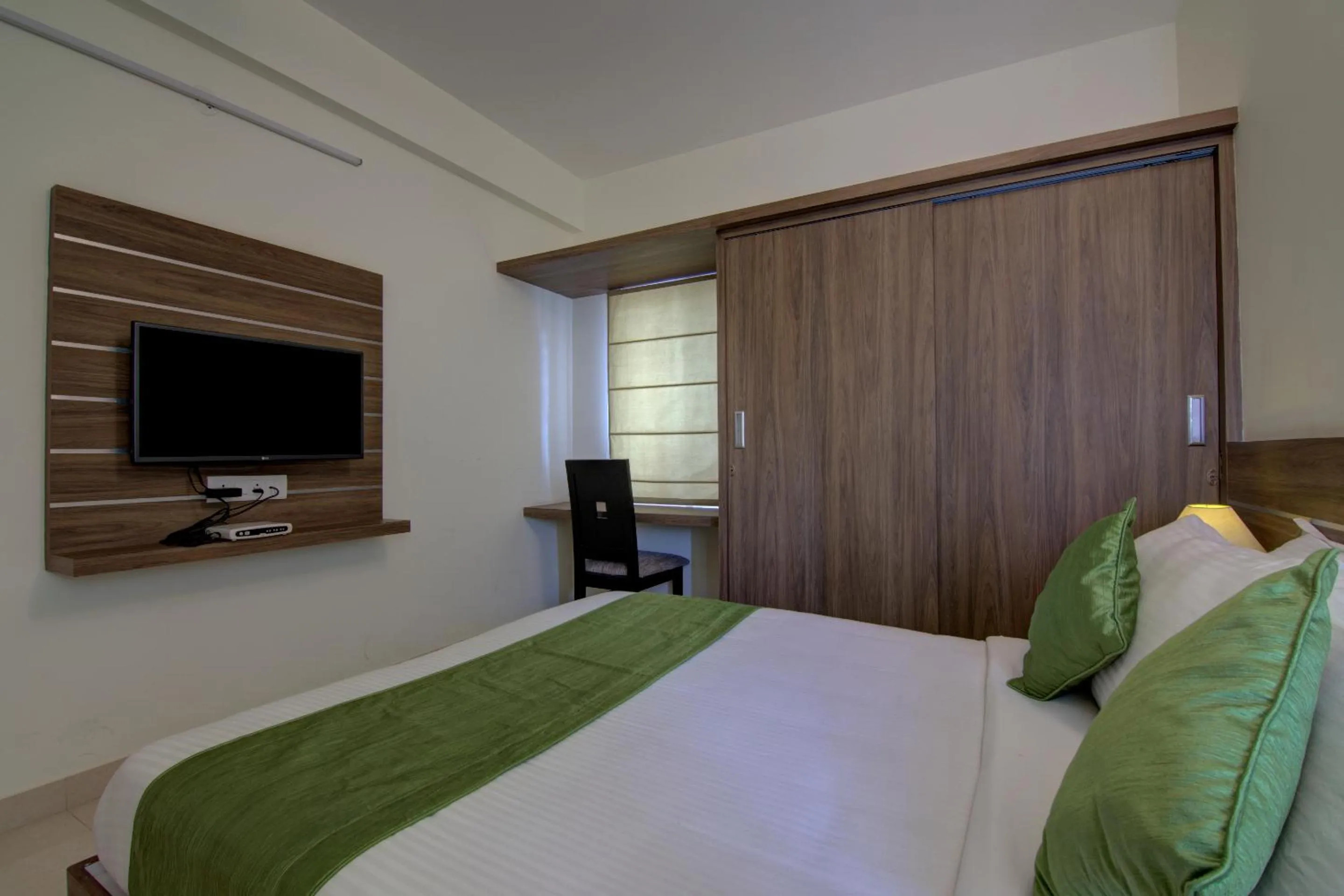 Bed in Sunshine Suites-Premium