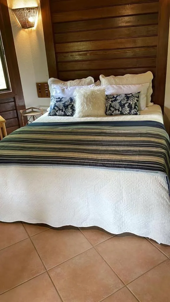 Bed in Pousada Vitorino