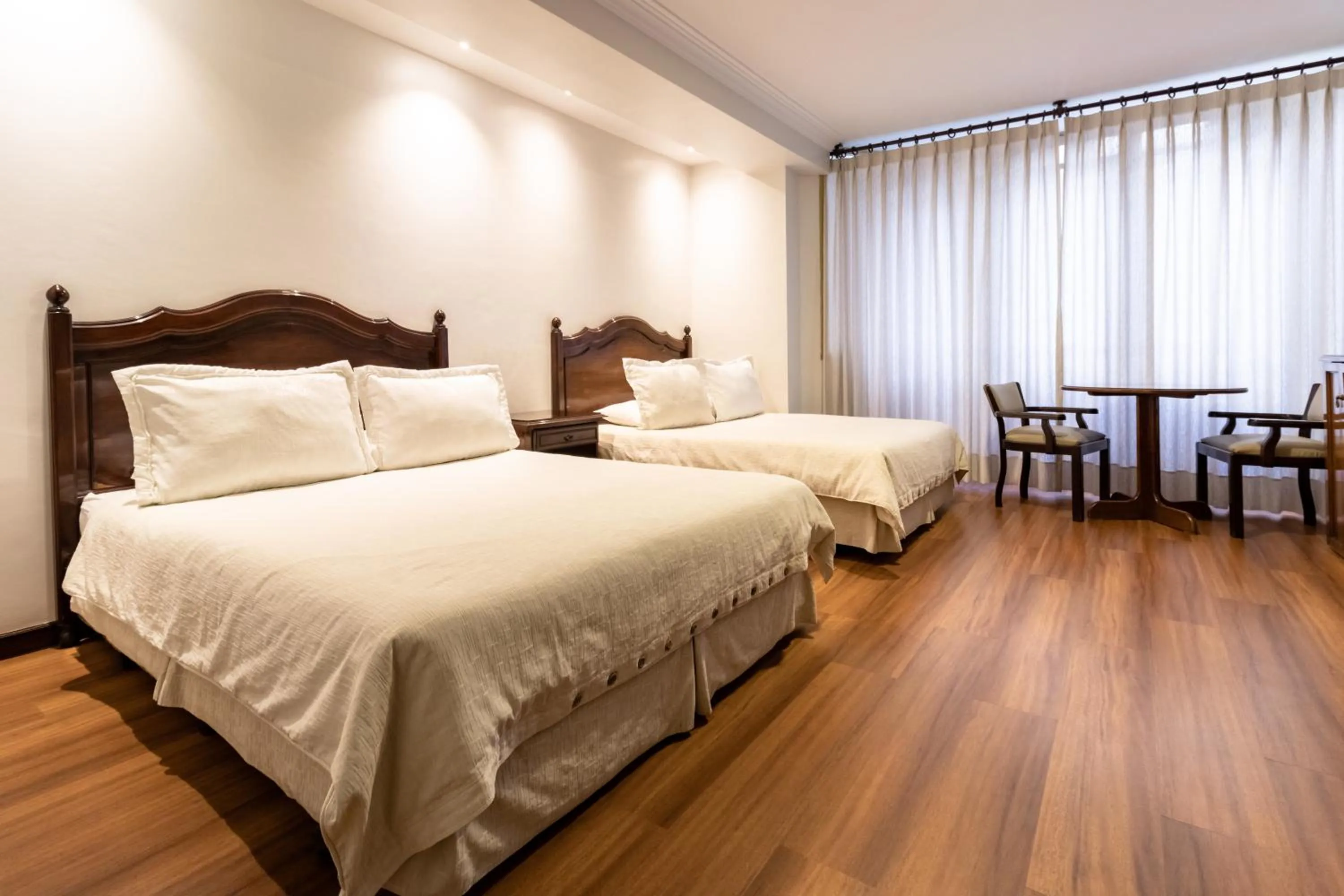 Bed in El Rey Palace Hotel