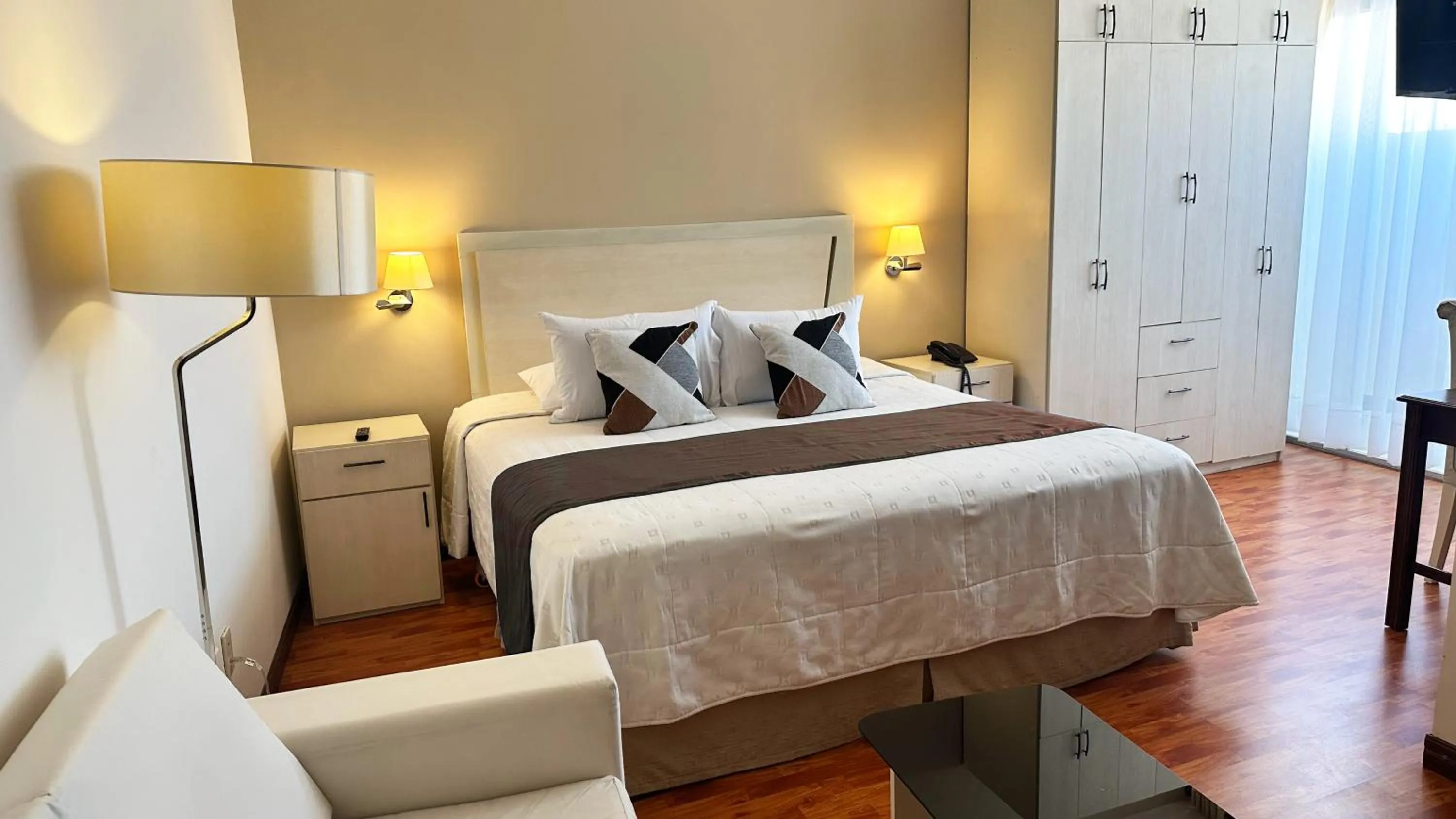 Bed in Delfines Apart Hotel