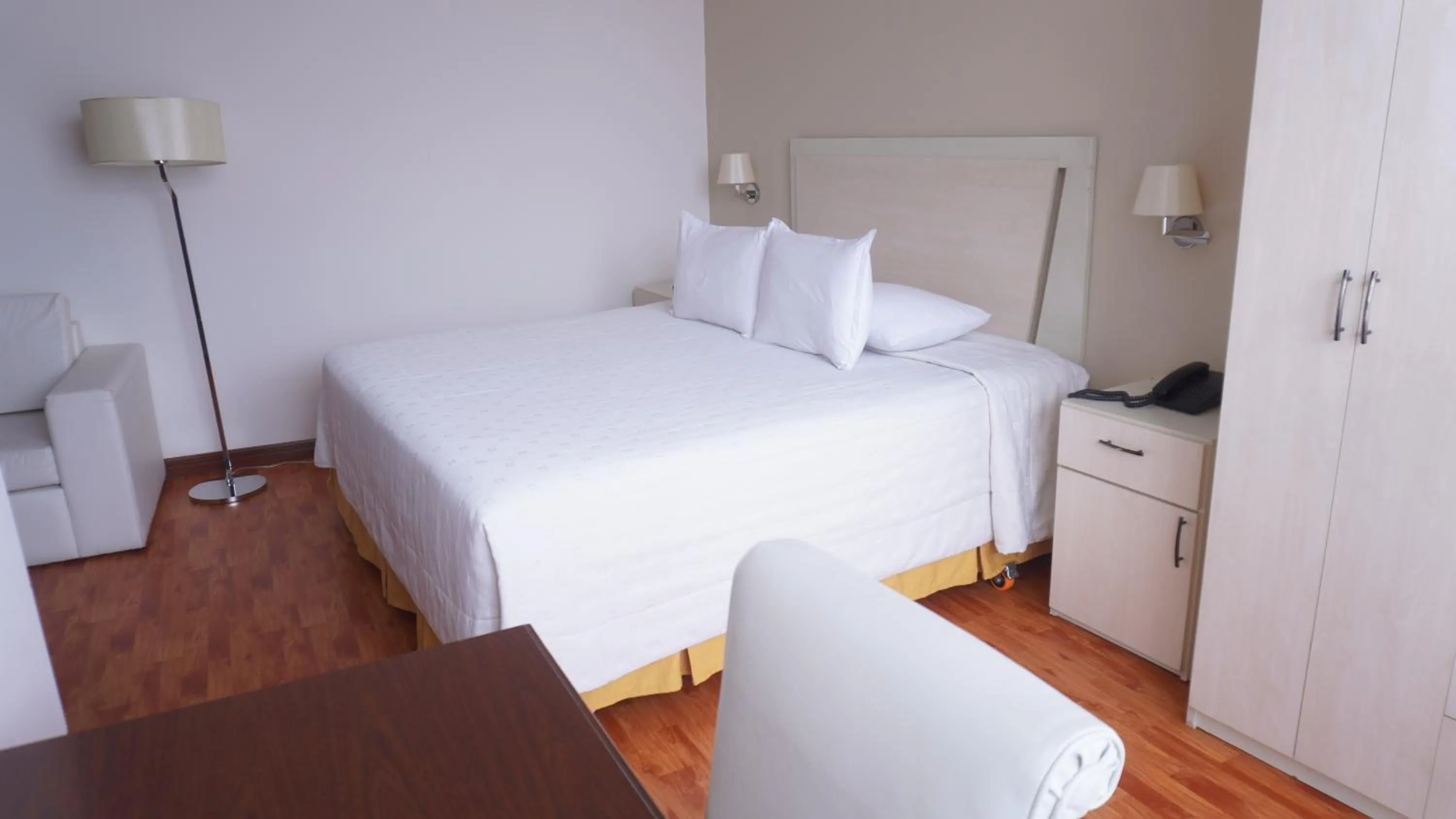 Bed in Delfines Apart Hotel