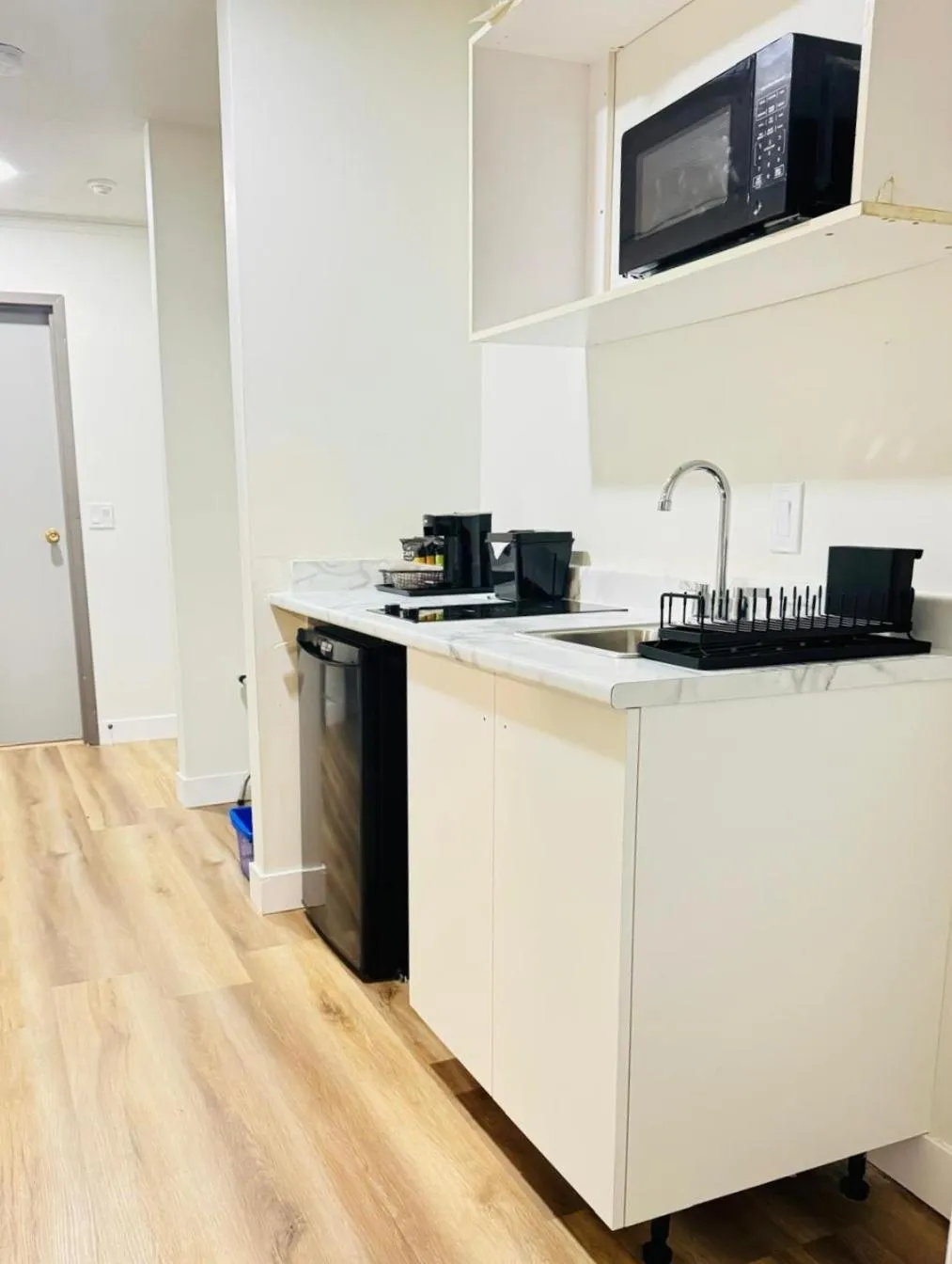 Kitchen or kitchenette in Ramada by Wyndham Dawson Creek