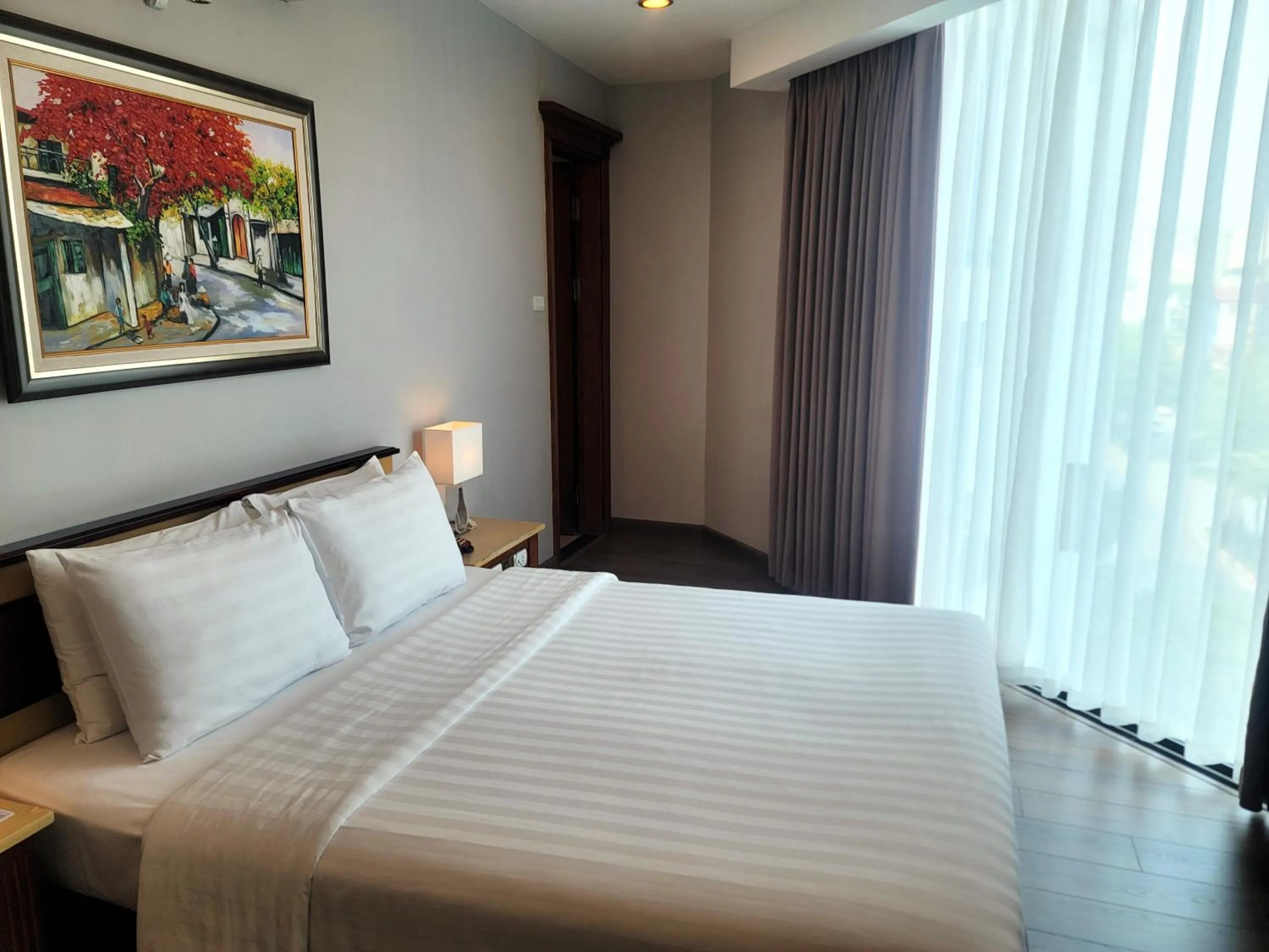 Photo of the whole room, Bed in Luxeden Hotel Hanoi