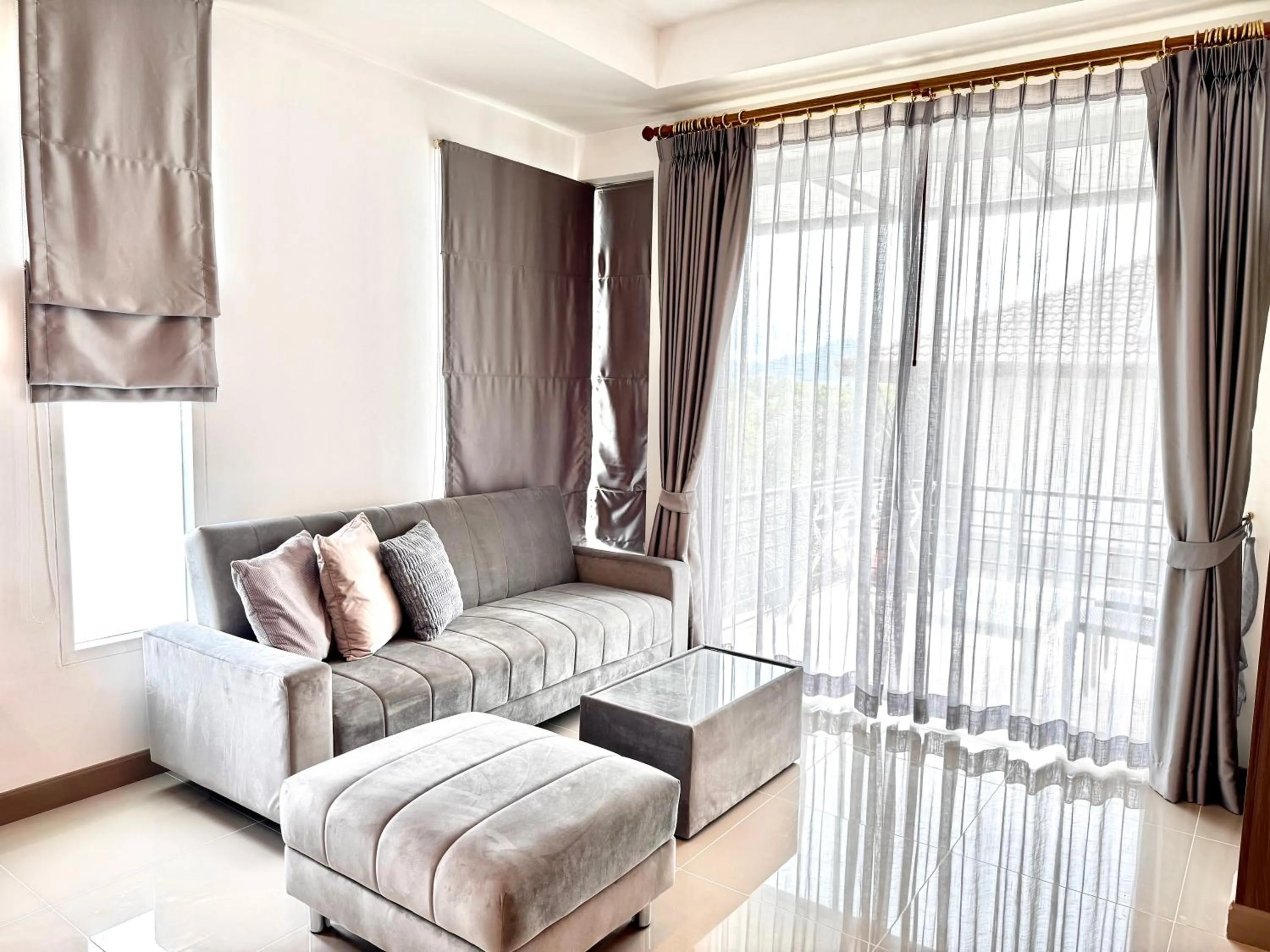 Living room, Bed in Sivana Place Phuket