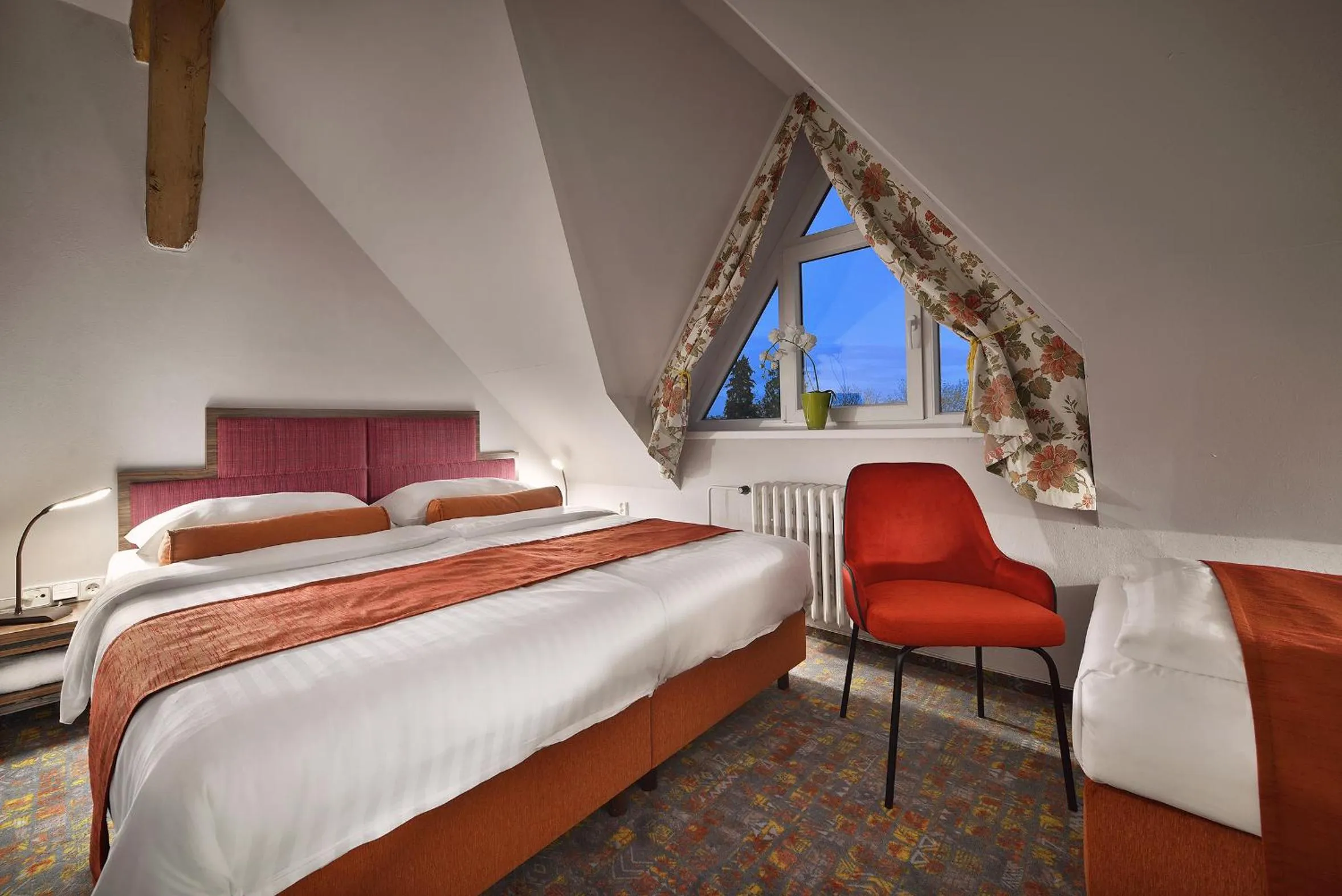 Bed in Maxmilian Lifestyle Resort