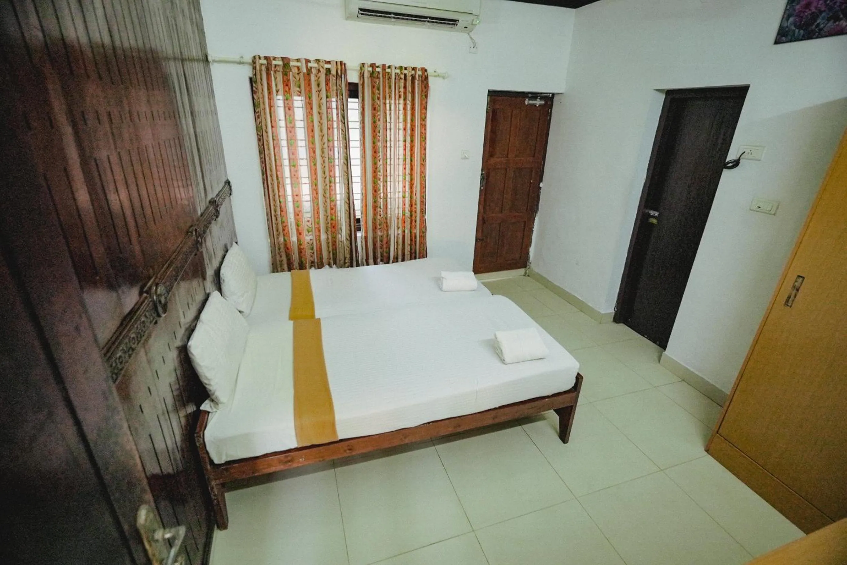 Bed in Raja Park Beach Resort