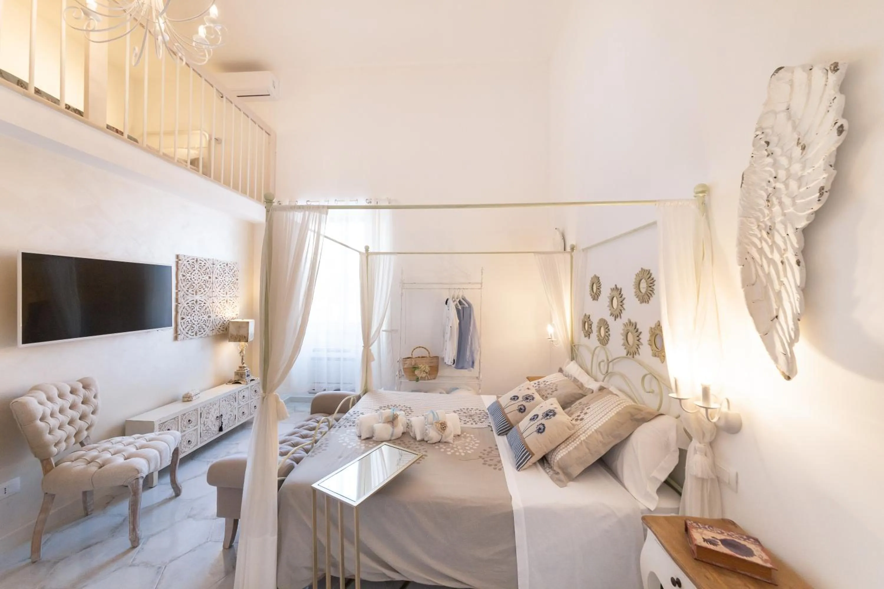 Bed in QuattroCuori Boutique Hotel & Spa