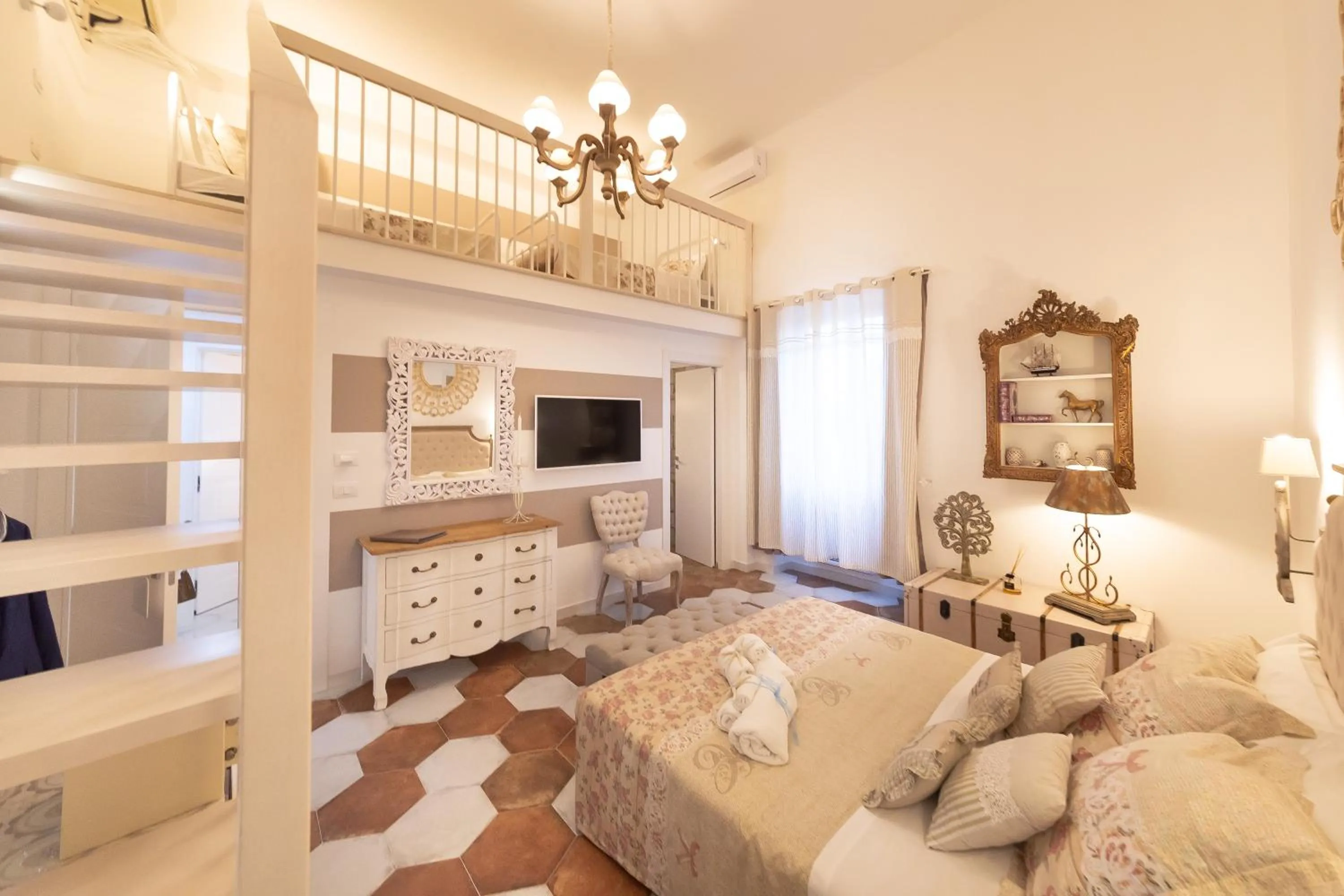 Bed in QuattroCuori Boutique Hotel & Spa