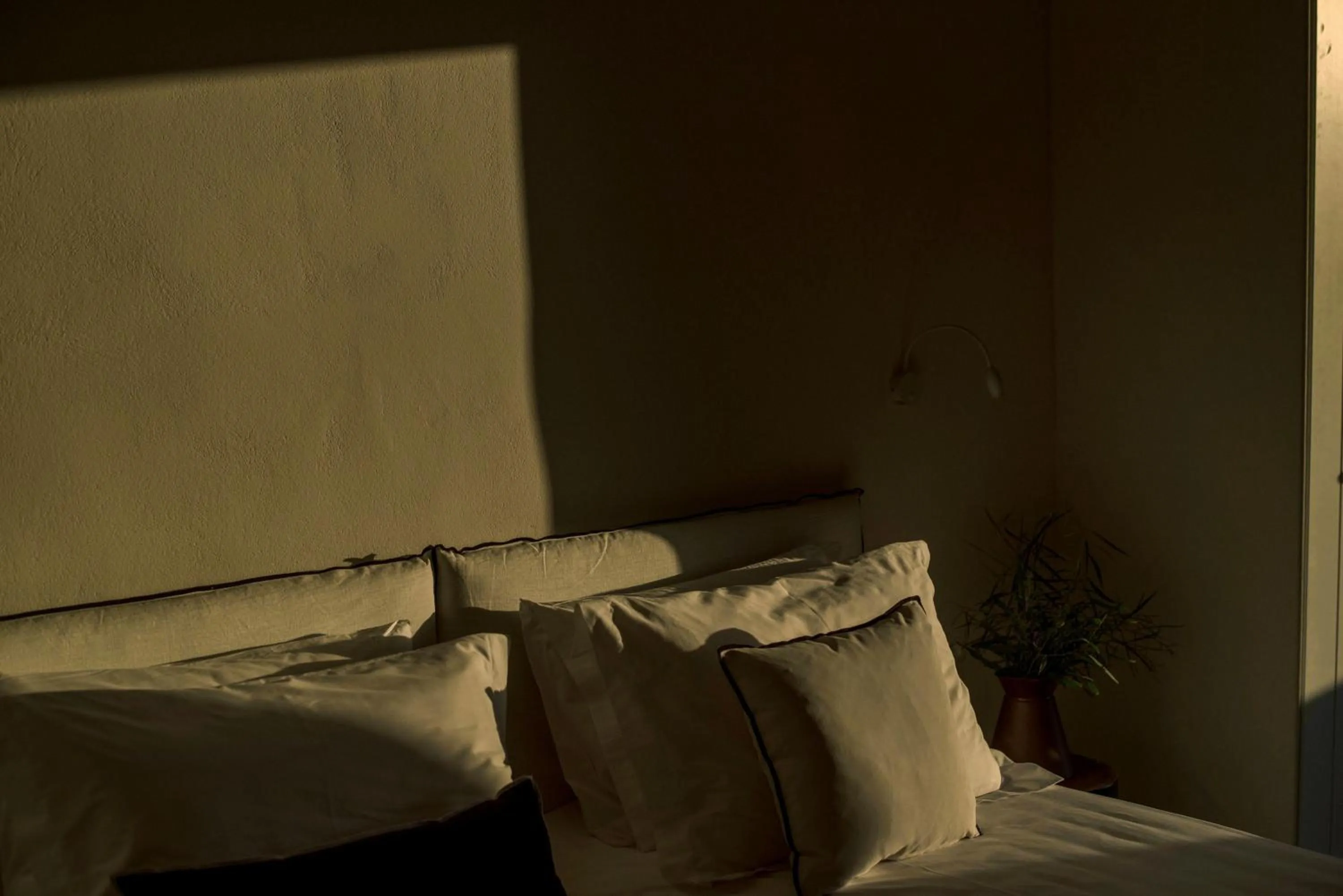 Bed in Melidron Hotel & Suites