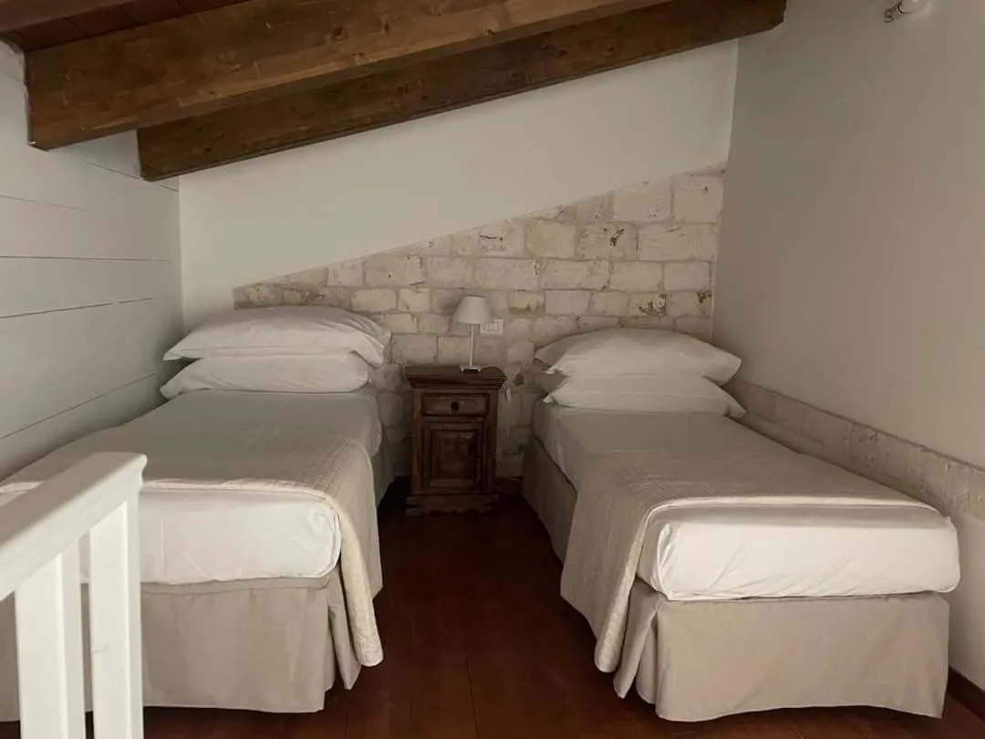 Bed in Masseria Montepaolo Dimora di Charme