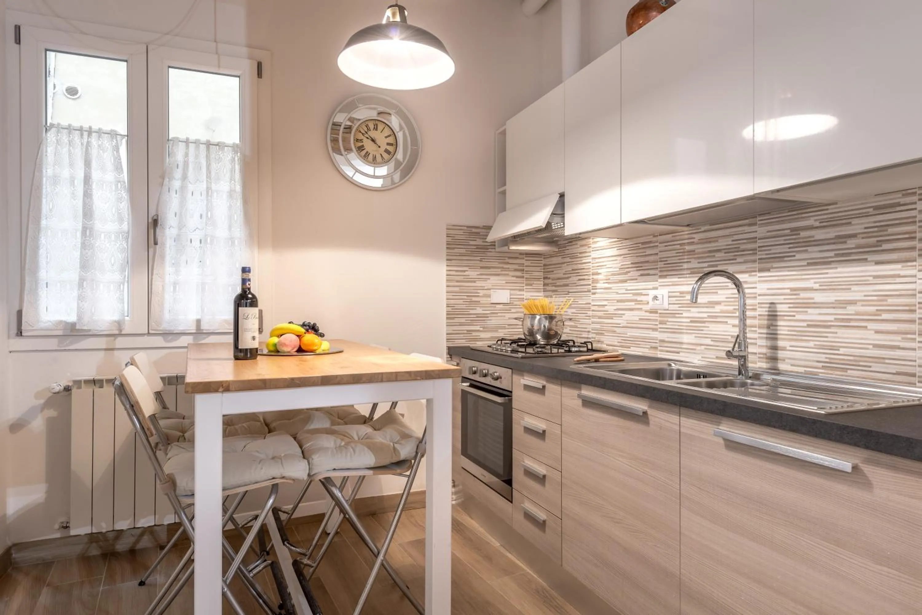 Kitchen or kitchenette in Santa Croce Place by Mmega