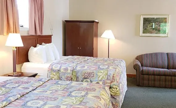 Bed in Gorham Motor Inn