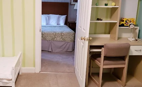 Bed in Gorham Motor Inn