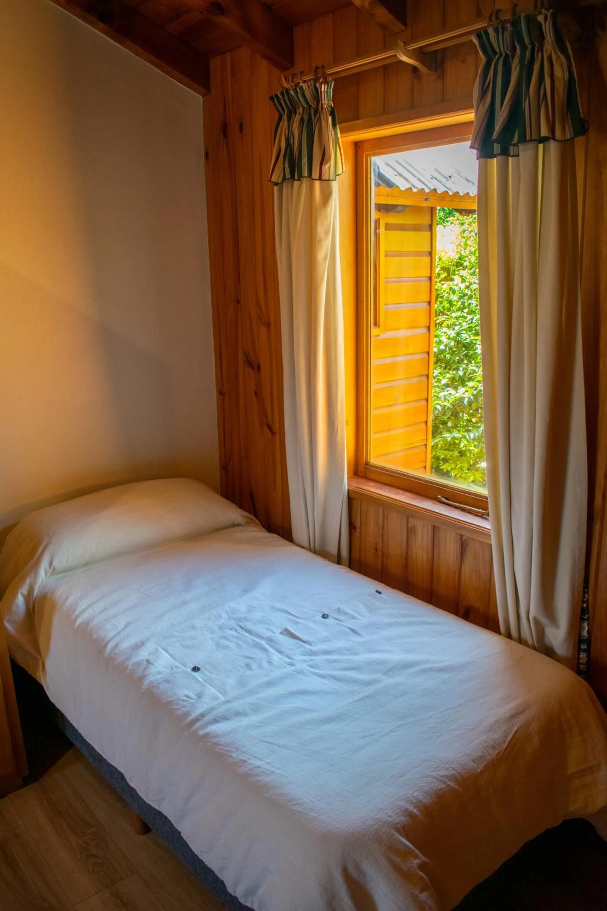 Bed in Hosteria y Cabañas Posada Quinen