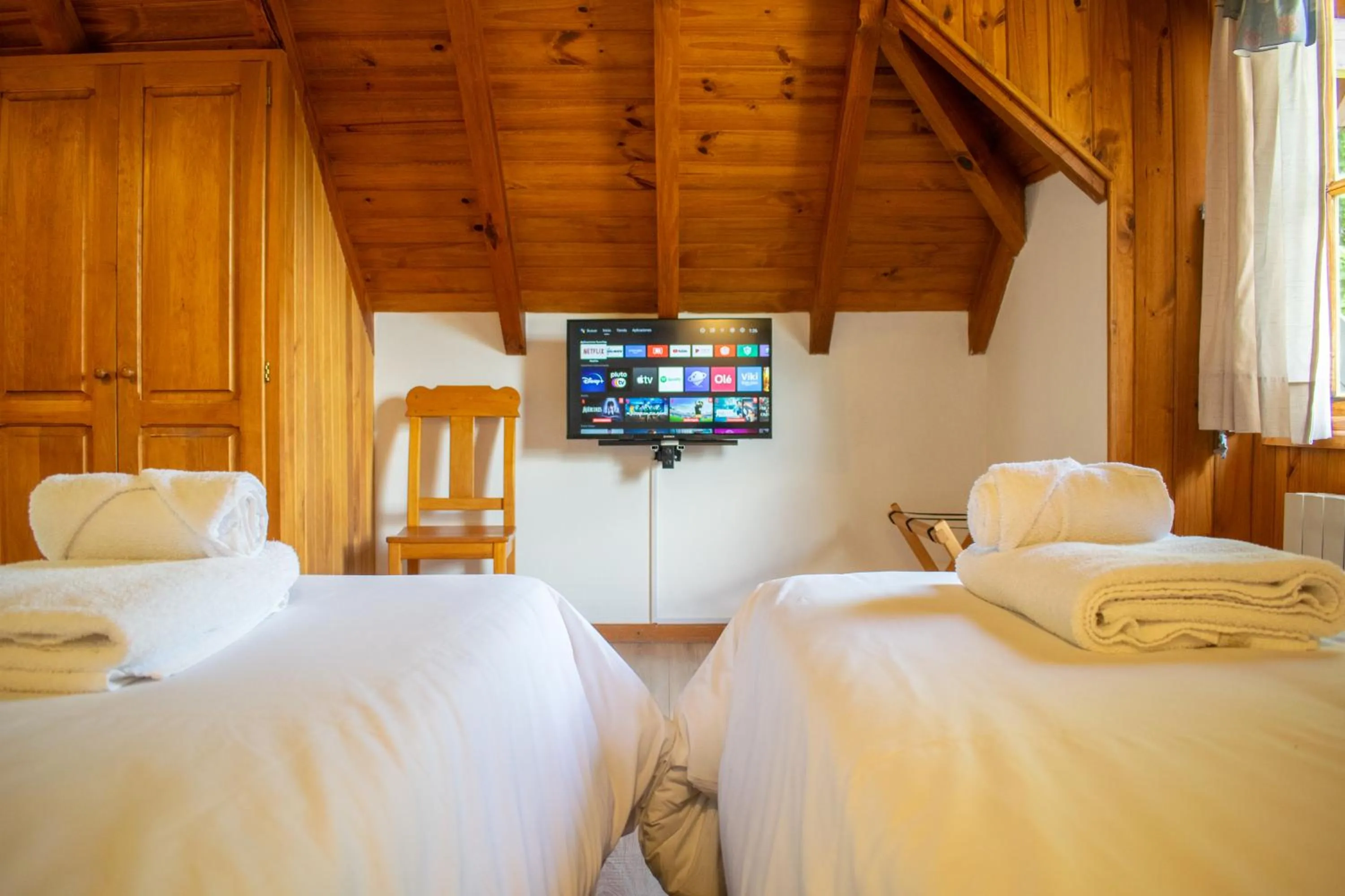 Bed in Hosteria y Cabañas Posada Quinen