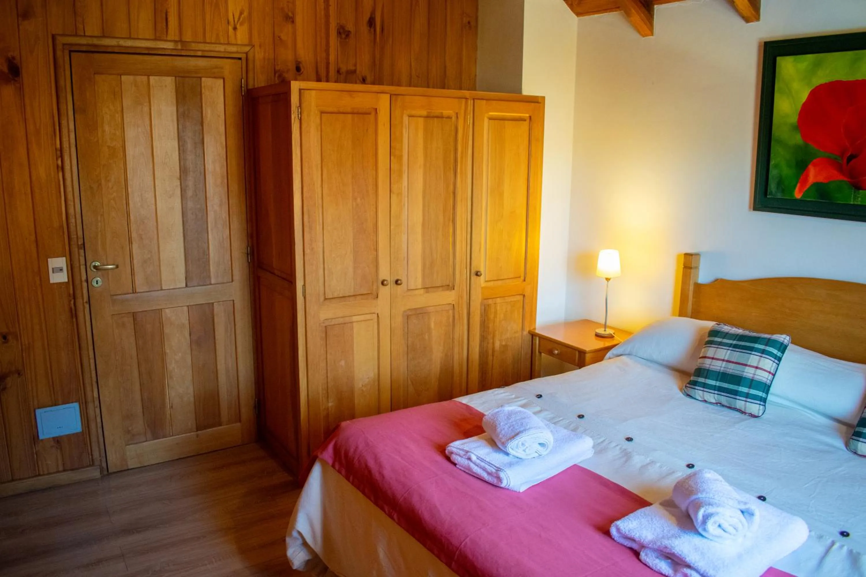 Bed in Hosteria y Cabañas Posada Quinen