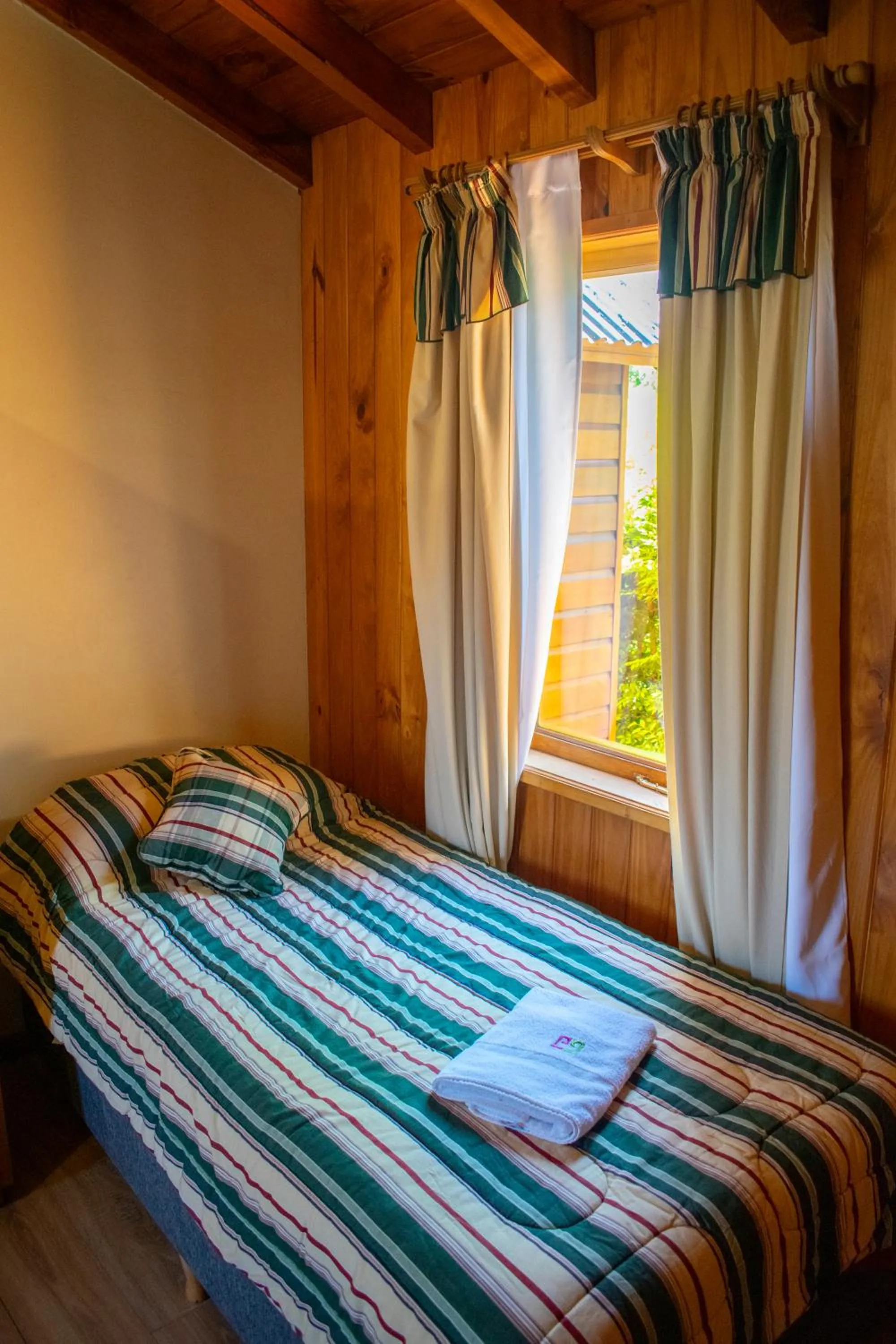 Bed in Hosteria y Cabañas Posada Quinen