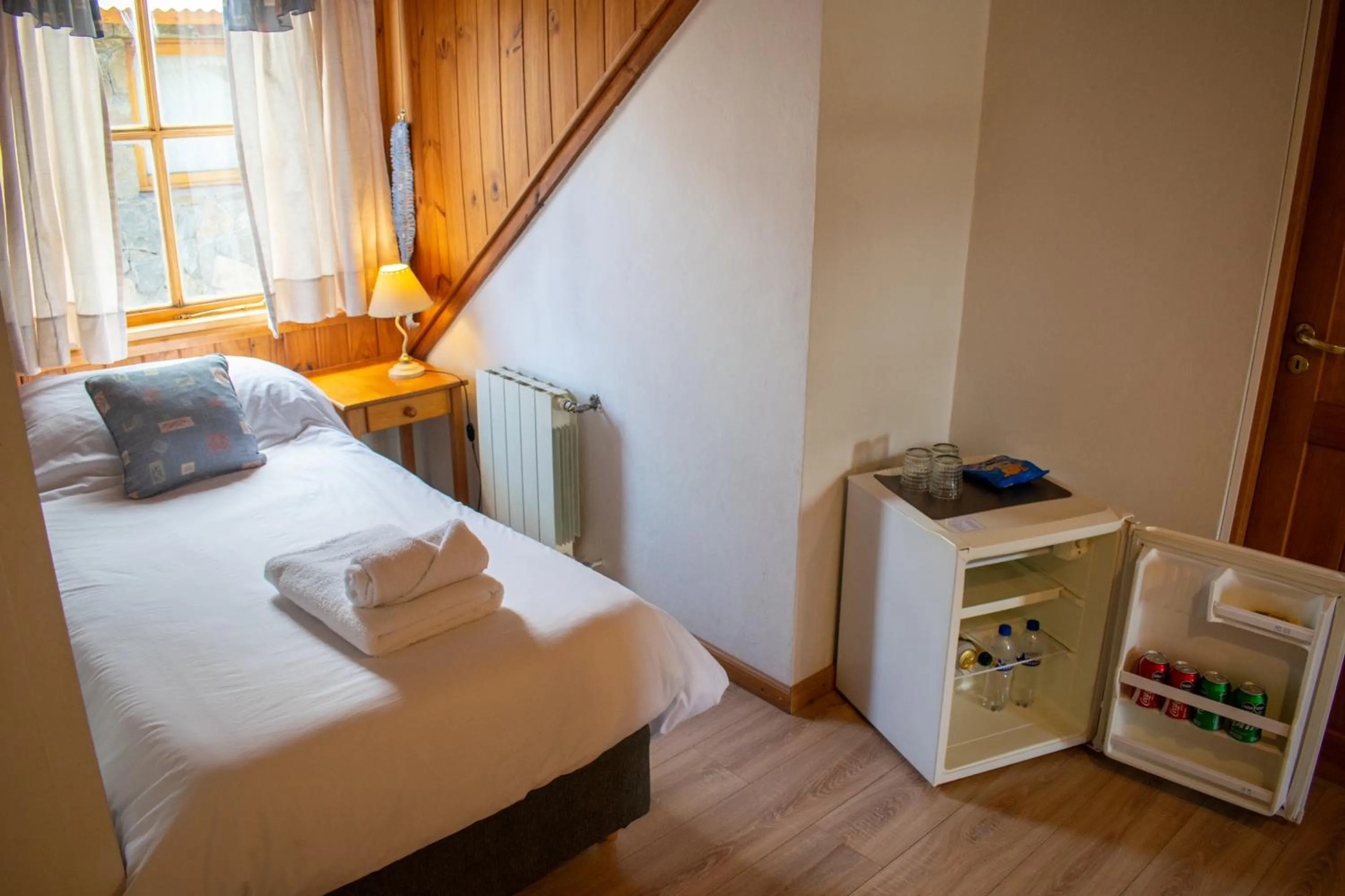 Bed in Hosteria y Cabañas Posada Quinen