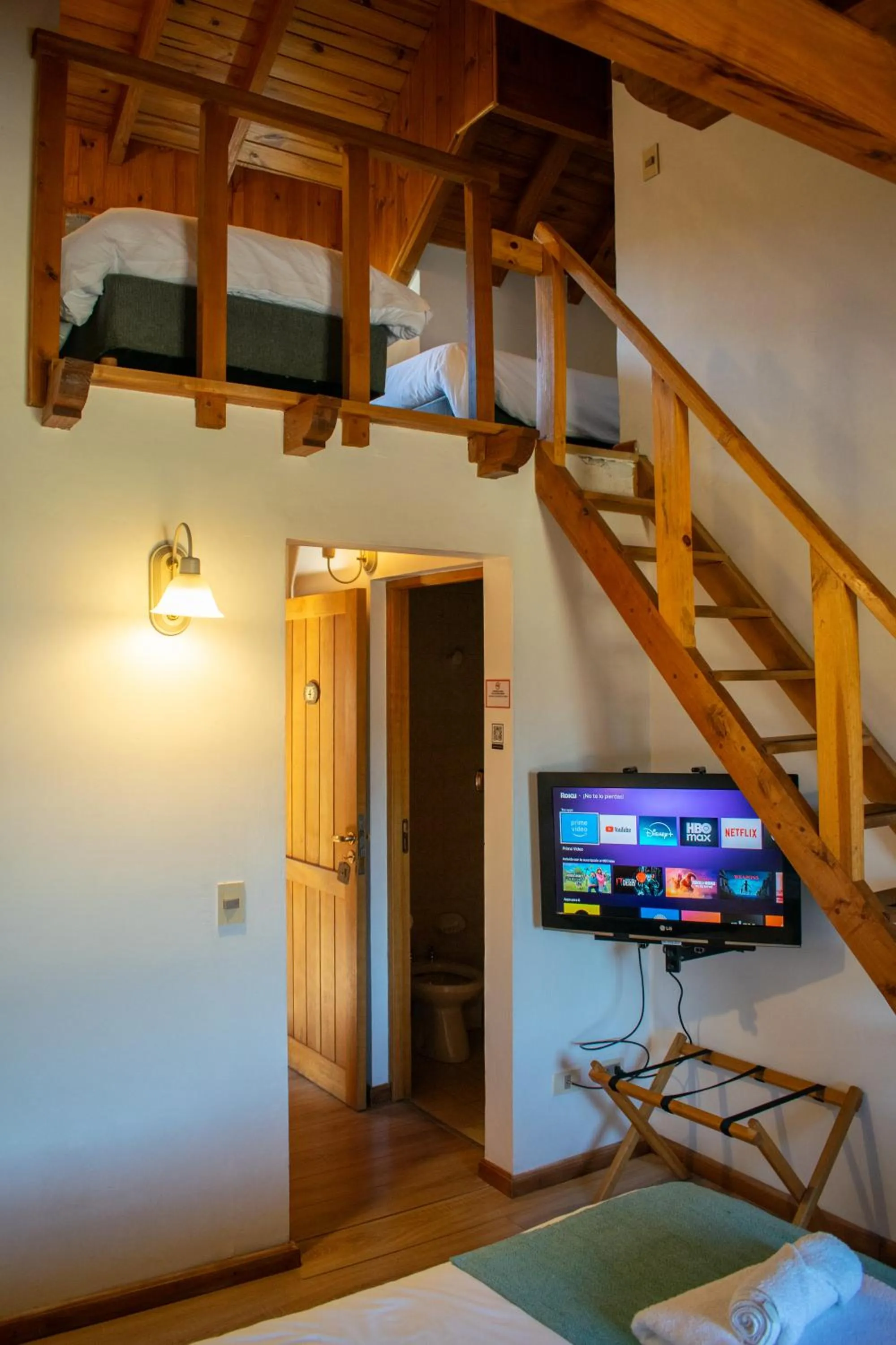 Bed in Hosteria y Cabañas Posada Quinen