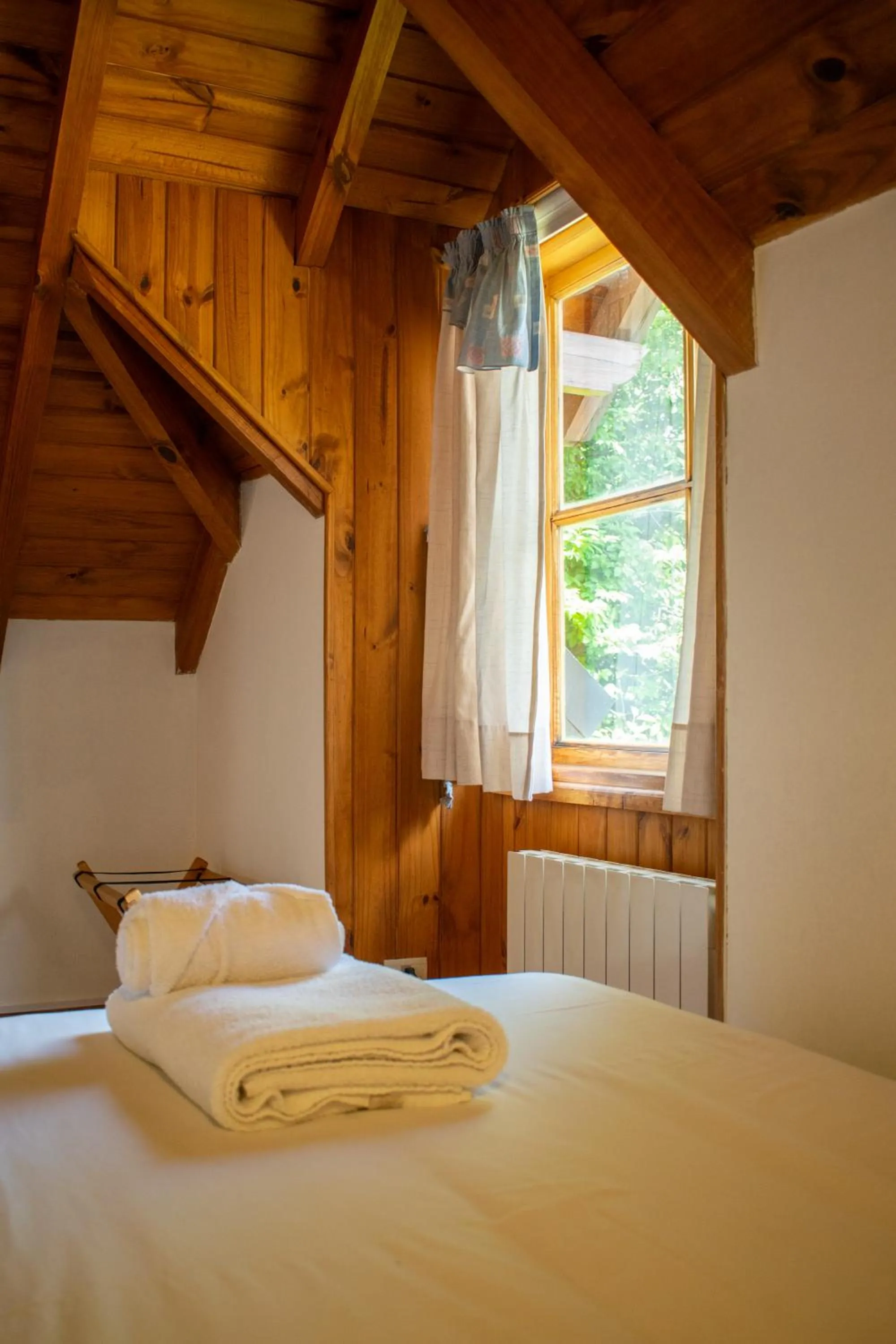 Bed in Hosteria y Cabañas Posada Quinen